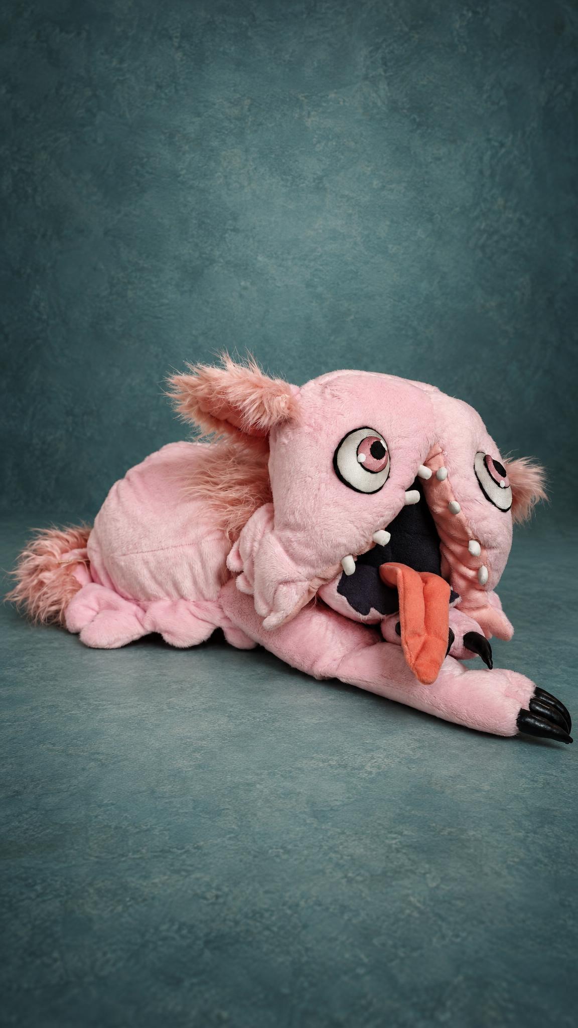 Mitty plushie from Made in Abyss, made to order, stretching one pink paw forward with glossy black claws
