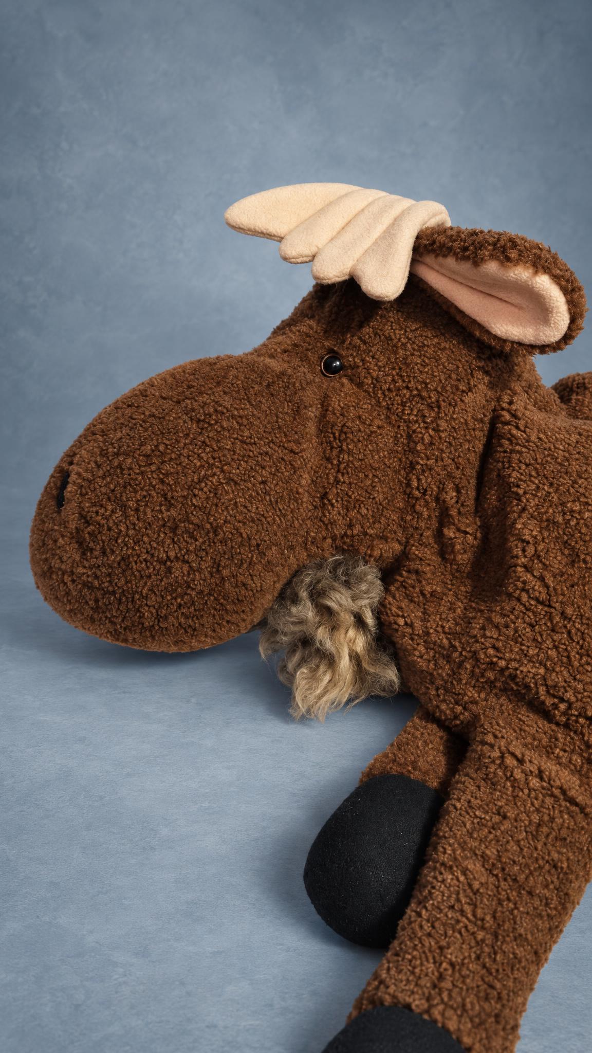 Custom moose plush with a shaggy fur bell under the chin, pink-lined ears and soft antlers, made to order