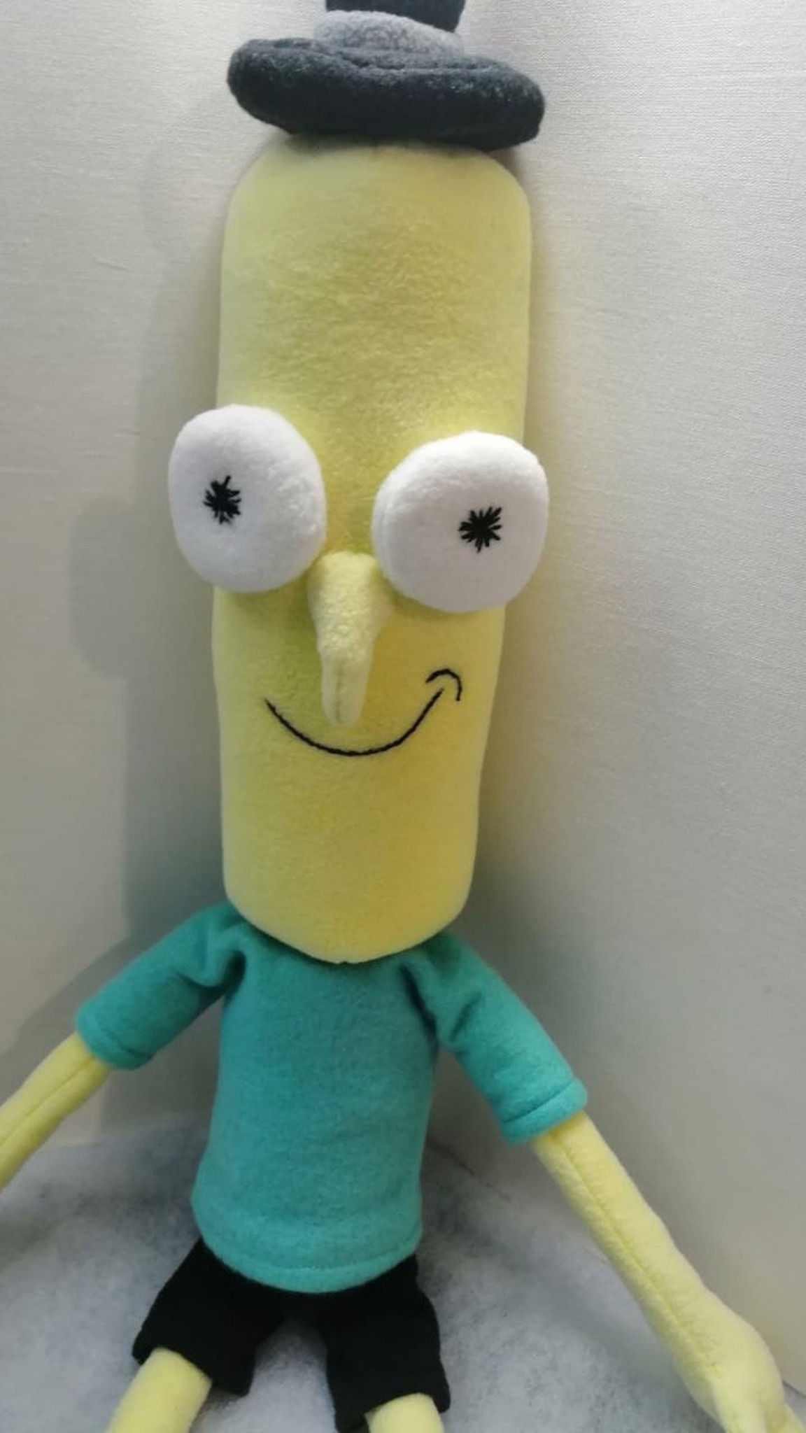 Mr. Poopybutthole plush with his big embroidered smile and black top hat, a Rick and Morty character made to order