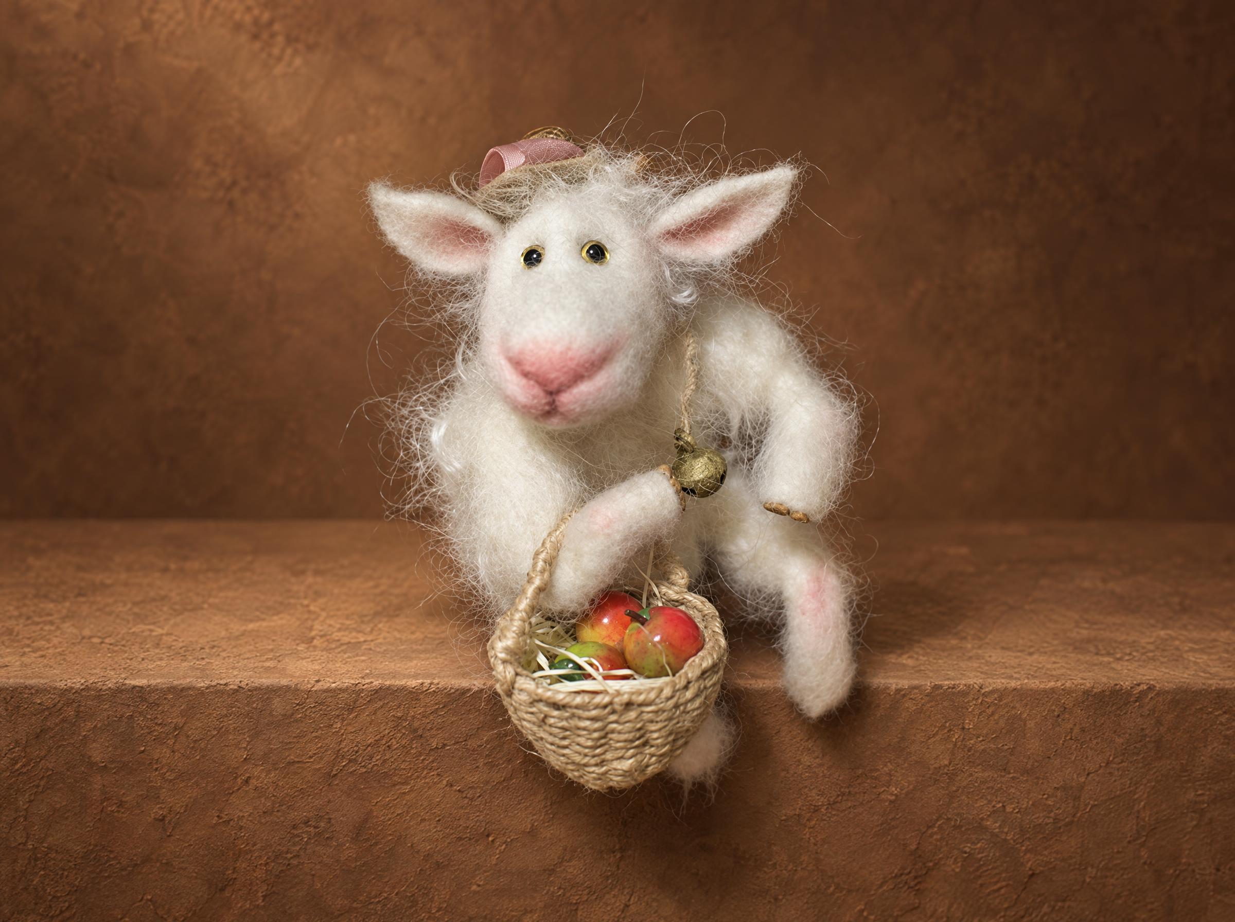 Needle felted goat made to order as a gift for her, white wool, pink nose, a woven basket of tiny red apples