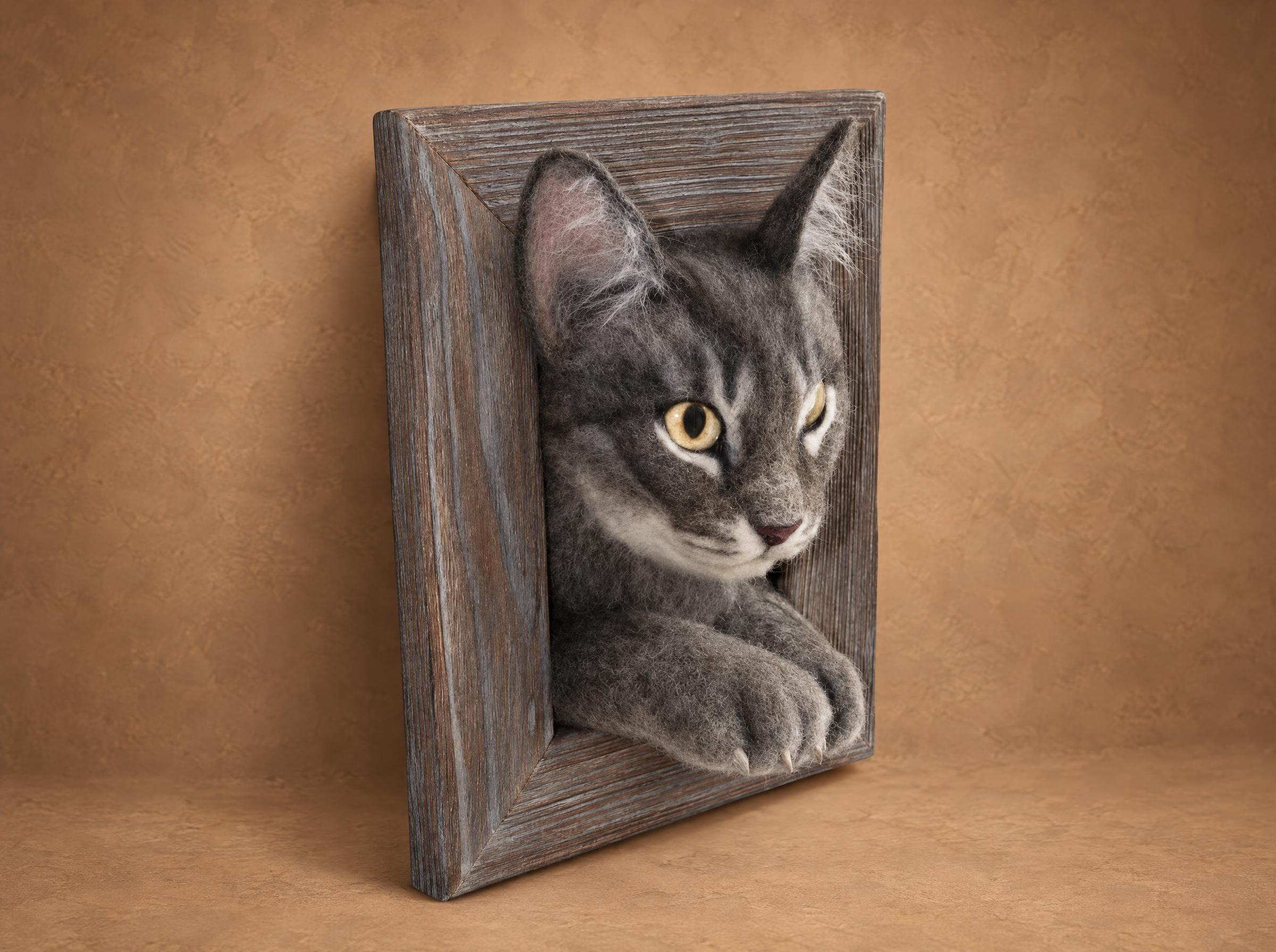 Needle-felted 3D memorial pet portrait of a grey tabby cat leaning out of a wooden frame, made to order