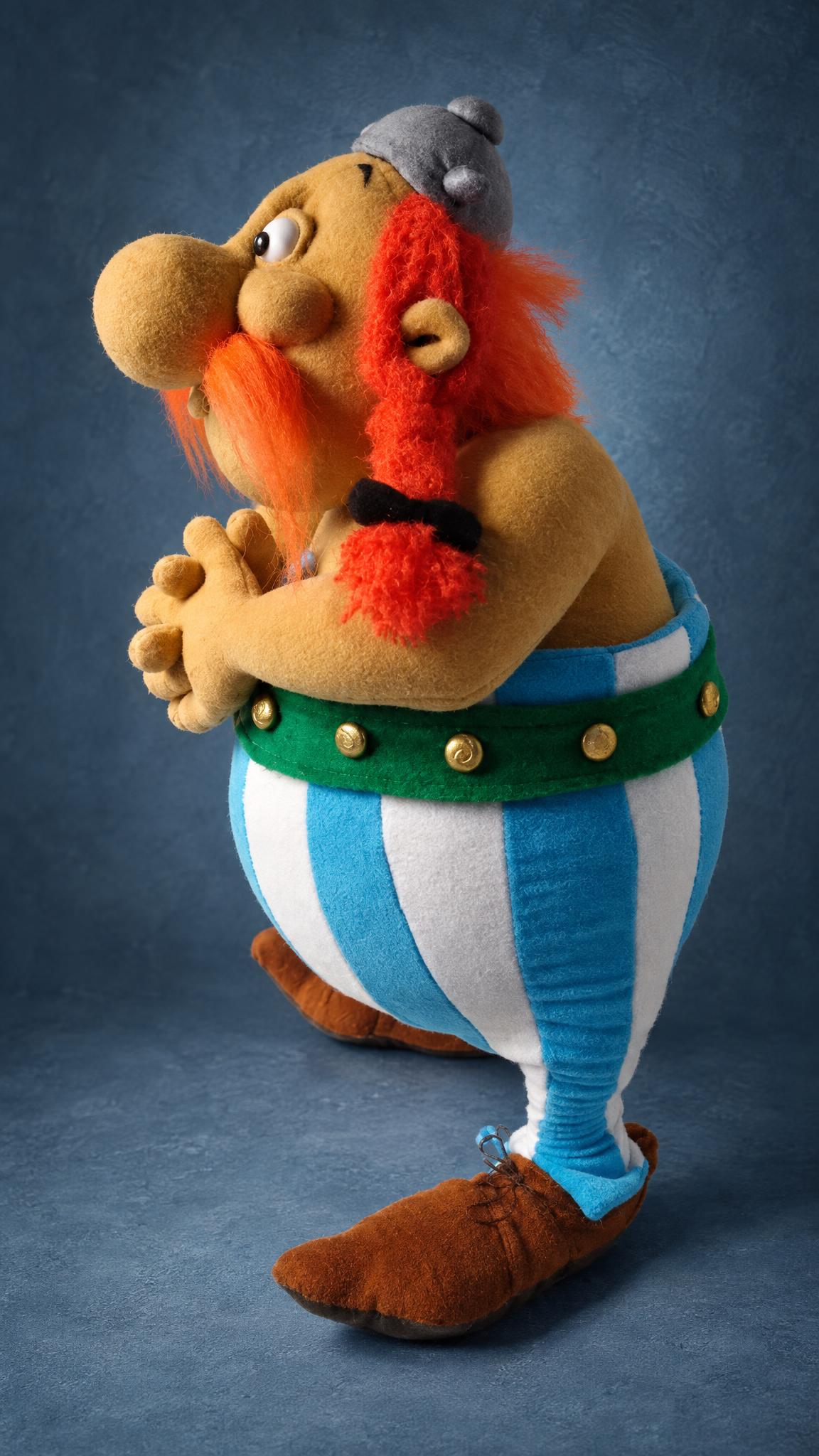 Handmade Obelix soft doll with clasped hands, red braids and striped trousers, a custom Asterix plush