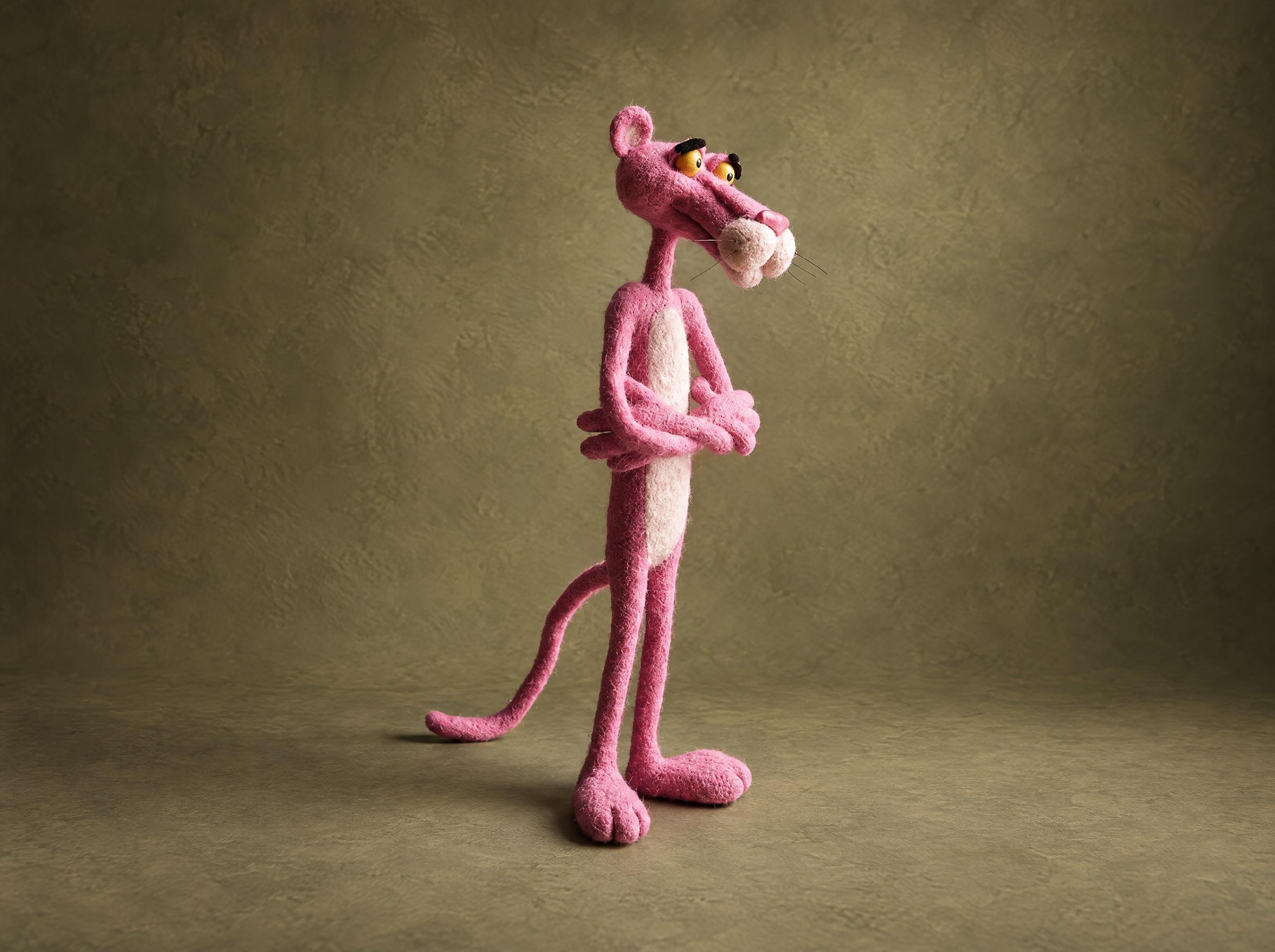 Needle-felted Pink Panther plush, arms crossed Needle-felted Pink Panther plush, arms crossed, long curling tail and yellow eyes, custom wool doll
