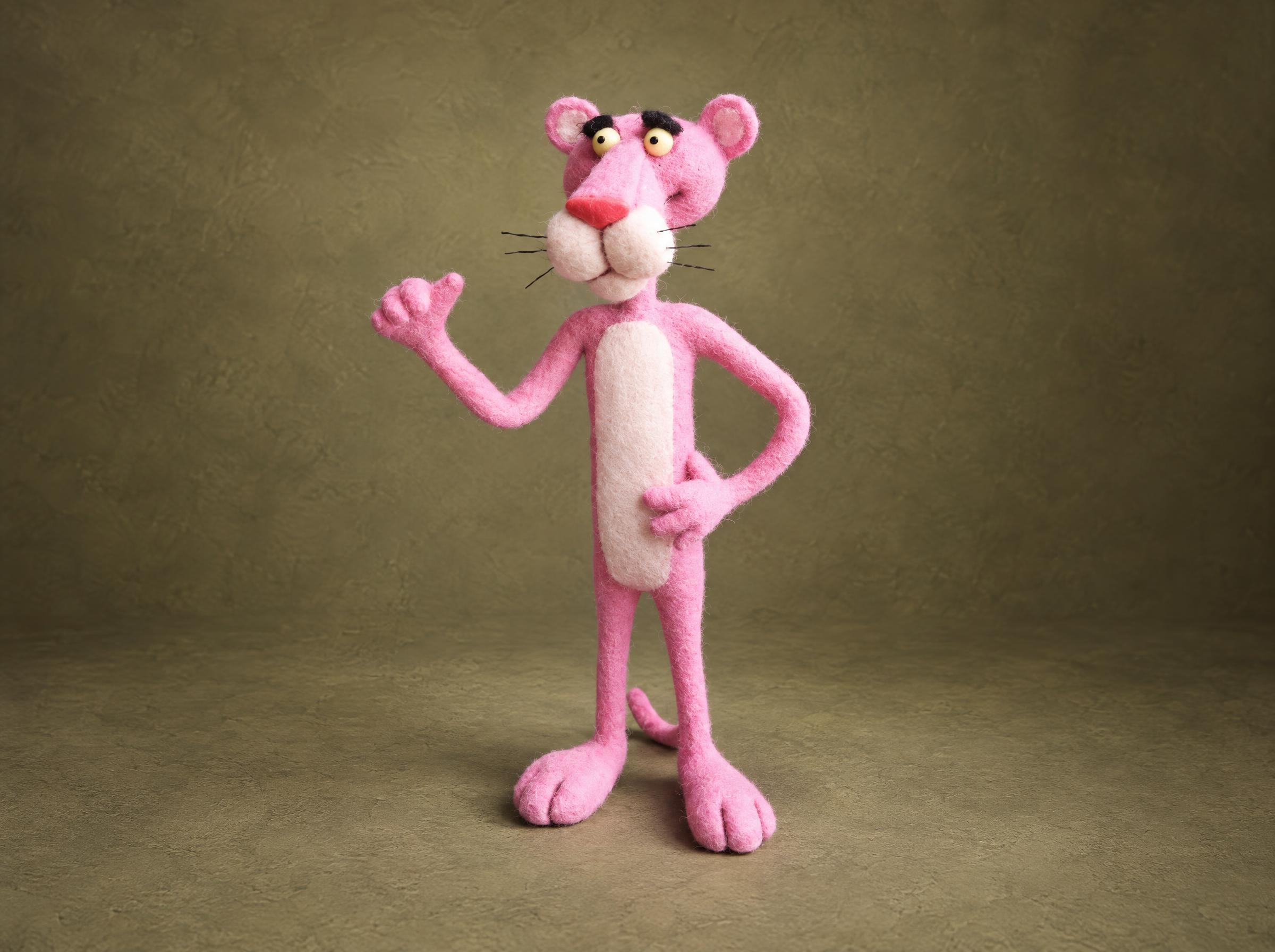 Handmade Pink Panther plush, hand on hip Handmade Pink Panther plush with a hand on hip and thumb up, needle-felted pink wool, made to order