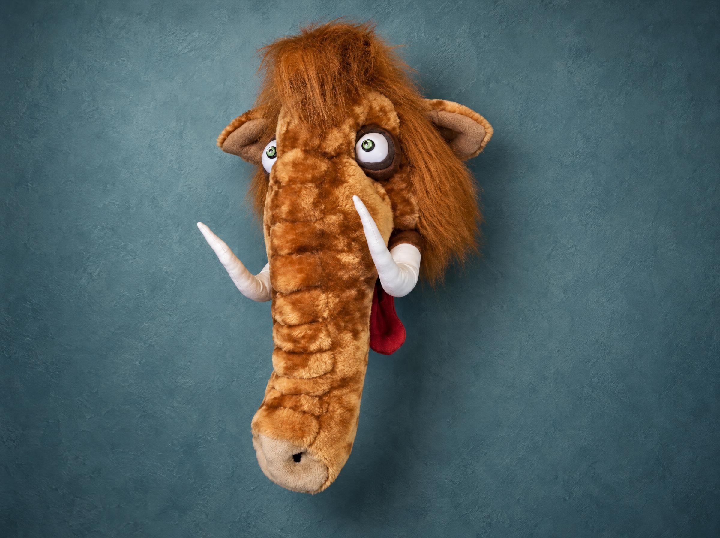 Plush woolly mammoth head, faux taxidermy made to order: shaggy ginger hair, soft cream tusks, red tongue