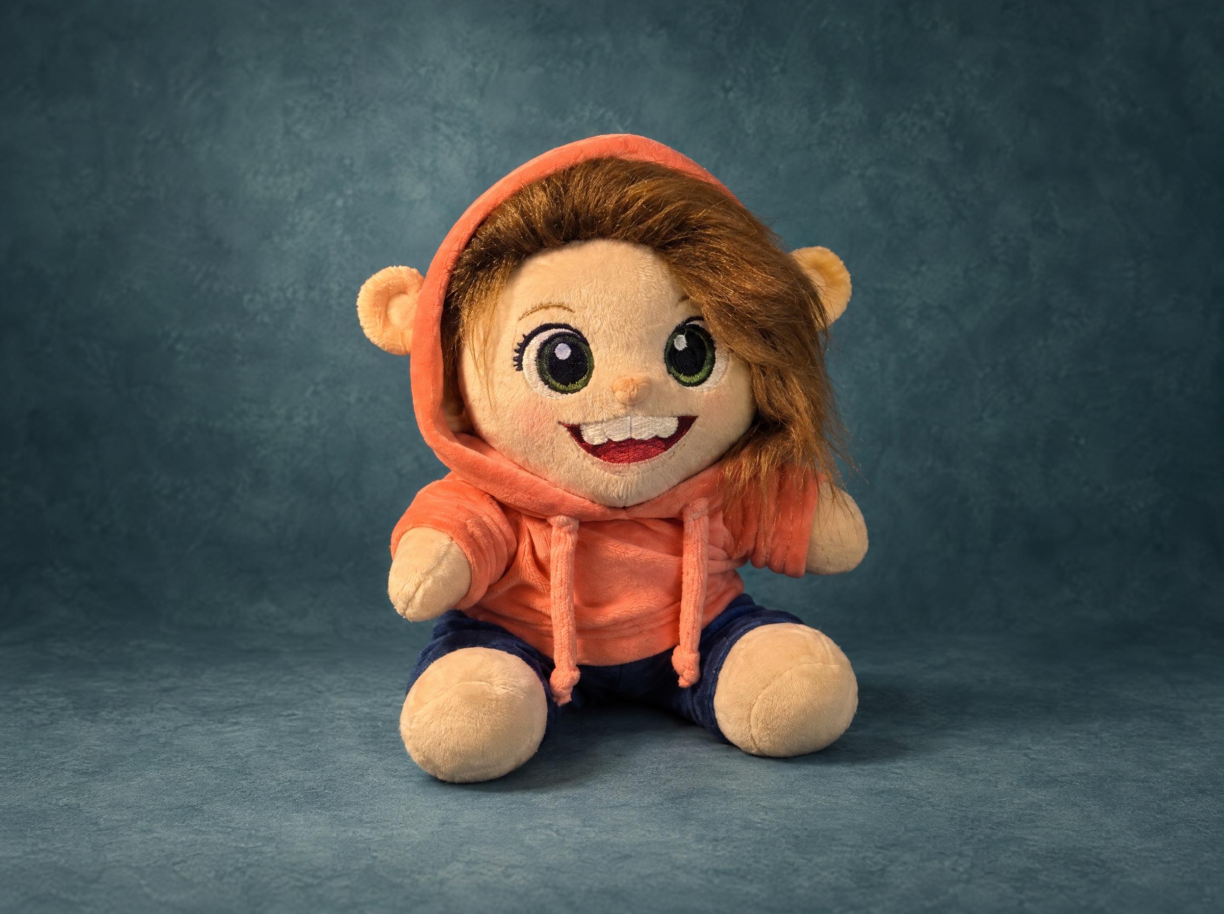 Plush portrait doll of a real girl in an orange bear-ear hoodie, handmade to order from photos