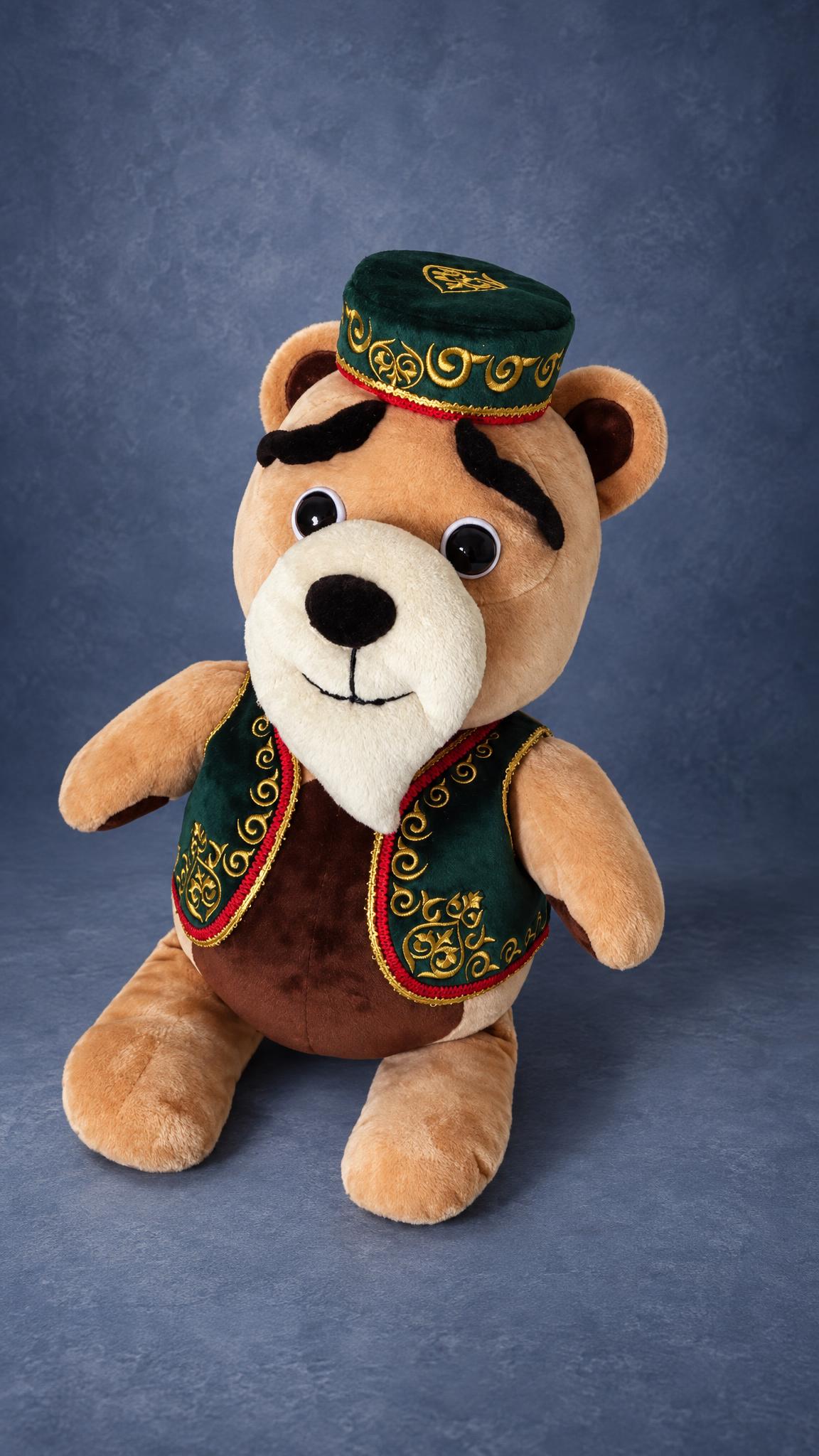 Plush version of the teddy bear prototype, made to order: skullcap, green velvet waistcoat, white-rimmed eyes