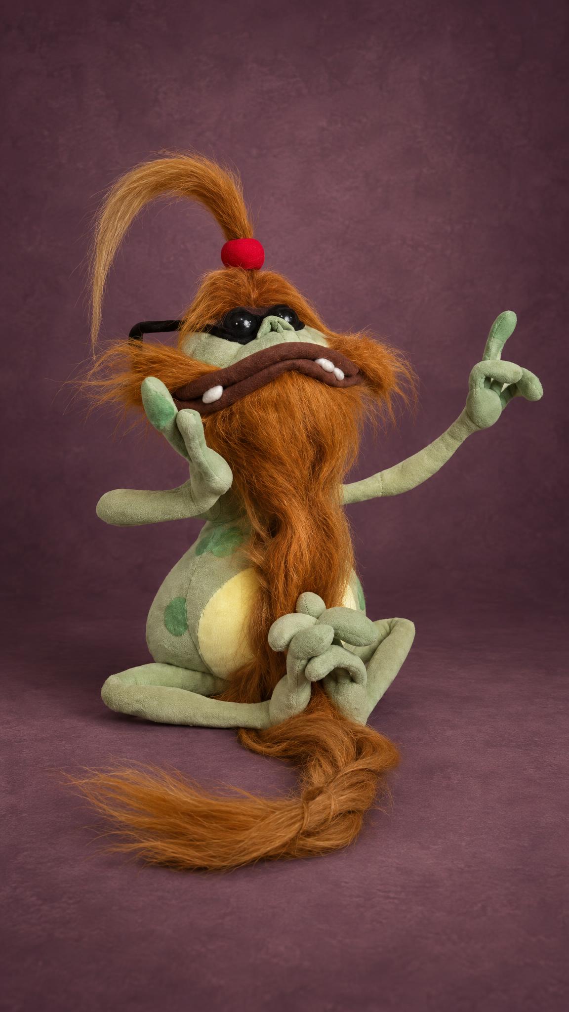 Custom Polokus plush from Rayman, handmade to order with long ginger fur, sunglasses and a red ball on top