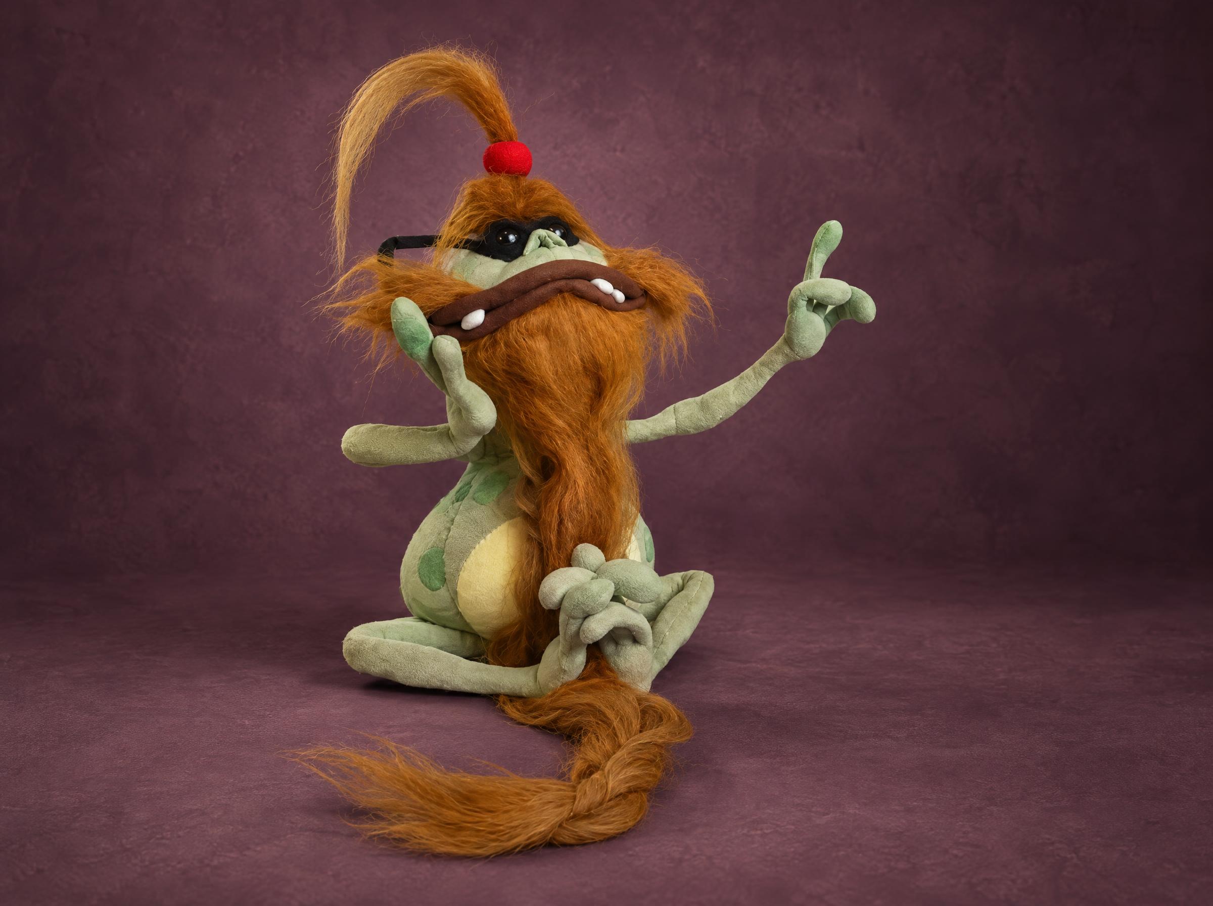 Custom Polokus plush from Rayman, handmade to order with long ginger fur, sunglasses and a red ball on top