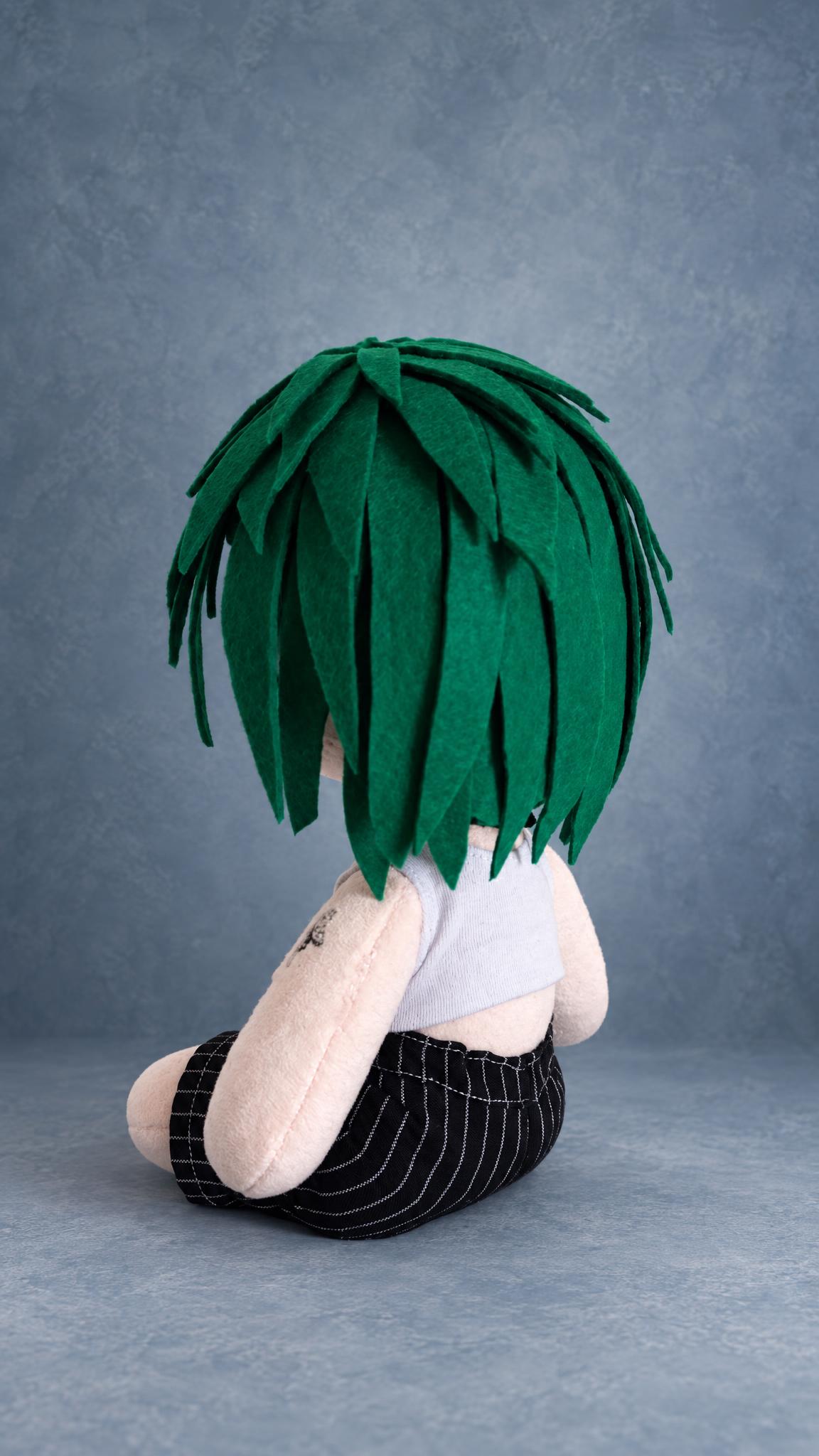 Portrait doll in a green felt wig, long layered strands and white crop top, a custom doll made to order
