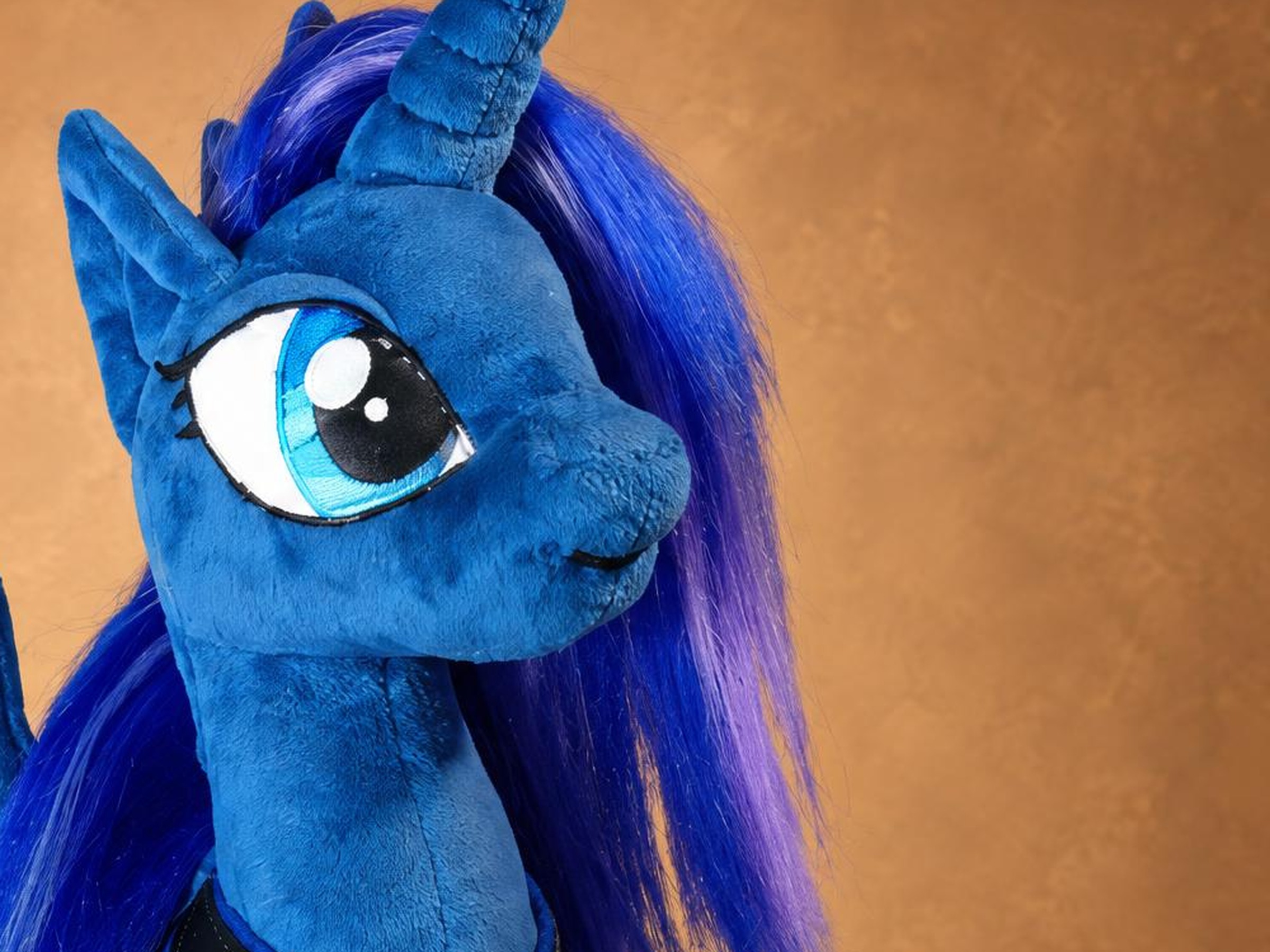 Handmade Princess Luna plush face with a blue spiral horn Handmade Princess Luna plush face: a large cyan eye with black lashes, a blue spiral horn and a silky mane