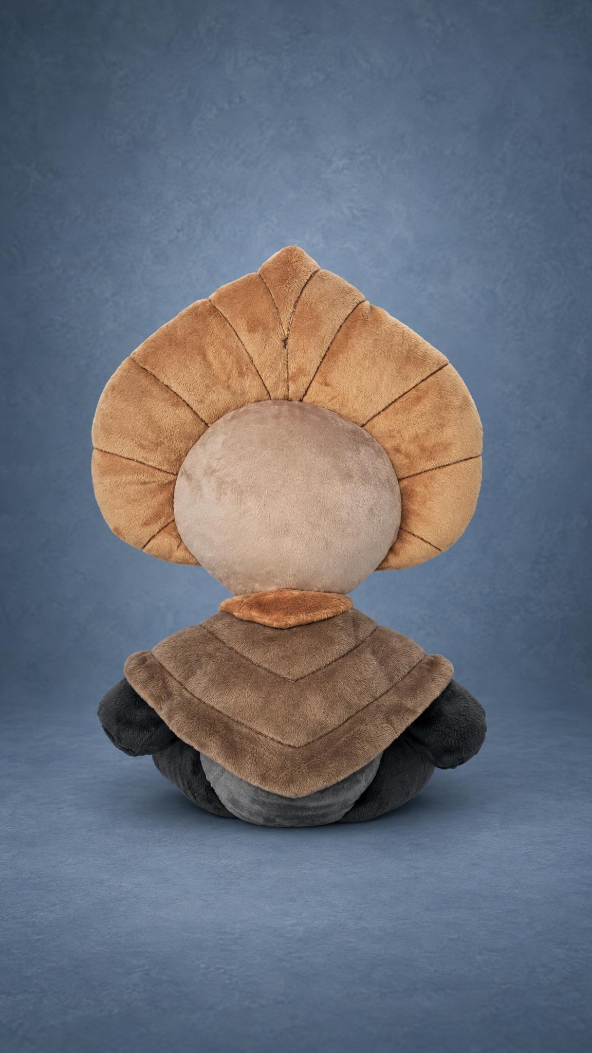 Radiance plush from Hollow Knight showing its ribbed tan crest and cape, a custom handmade game plush