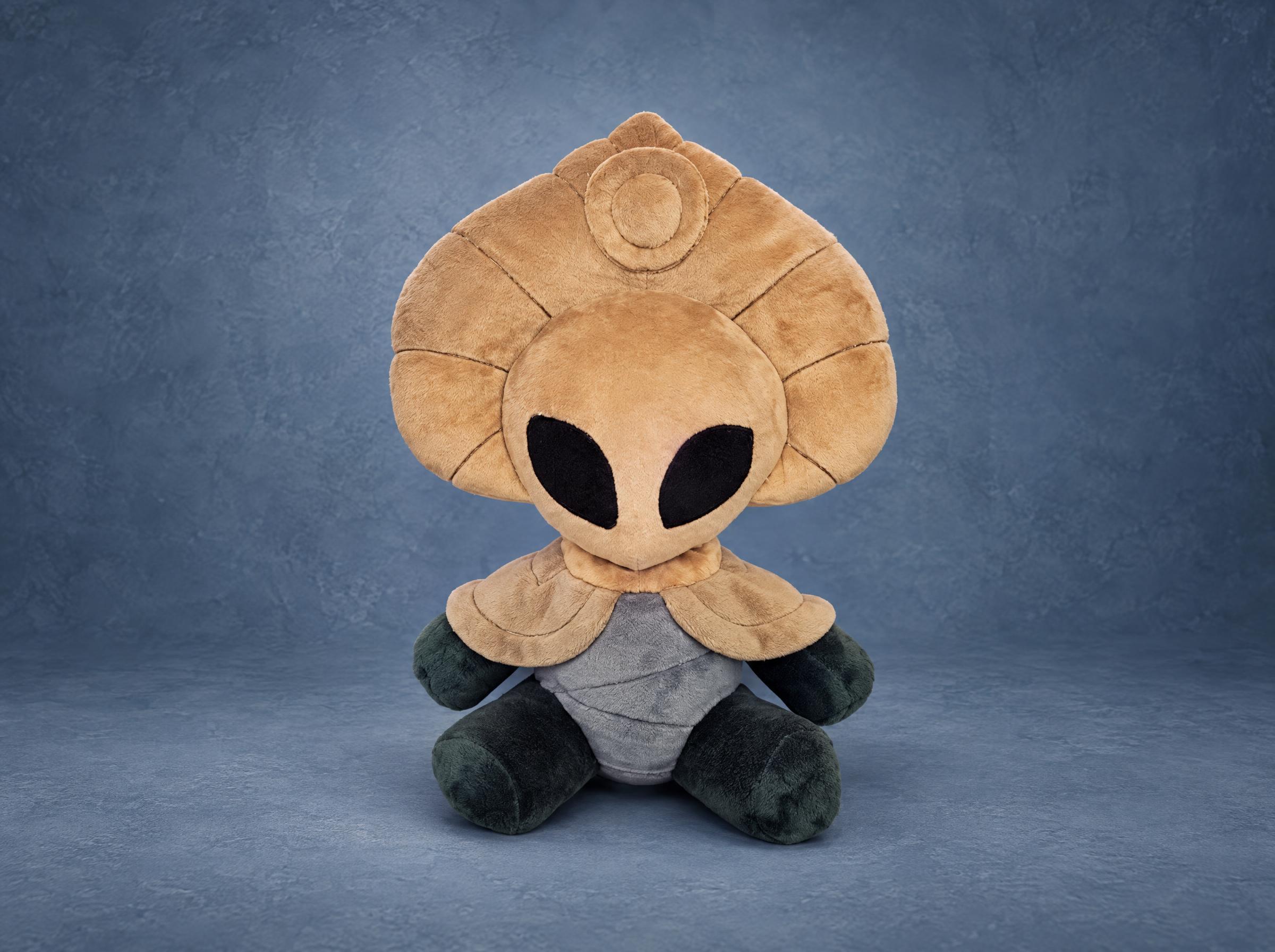 Custom Radiance plush from Hollow Knight, handmade to order with a tan crest, black eyes and a dark grey body
