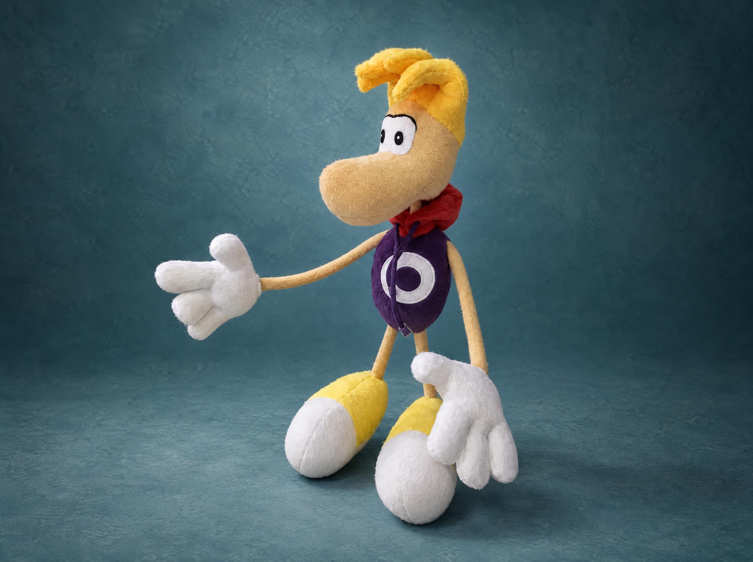 Custom Rayman plush, handmade to order with yellow hair, a red hood, a purple body and floating white gloves
