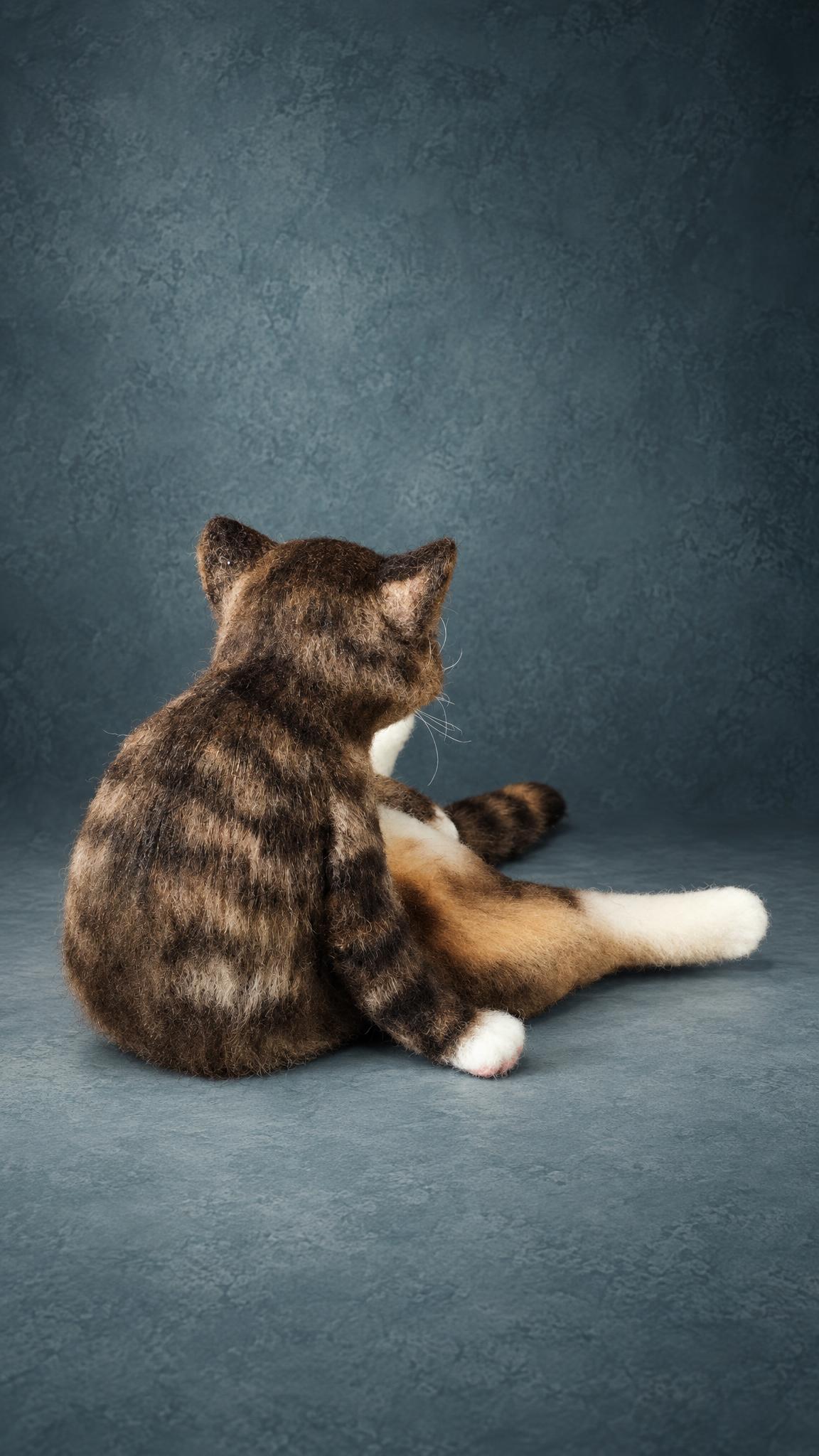 Realistic tabby cat sculpture in felted wool, striped back and ringed tail, made to order