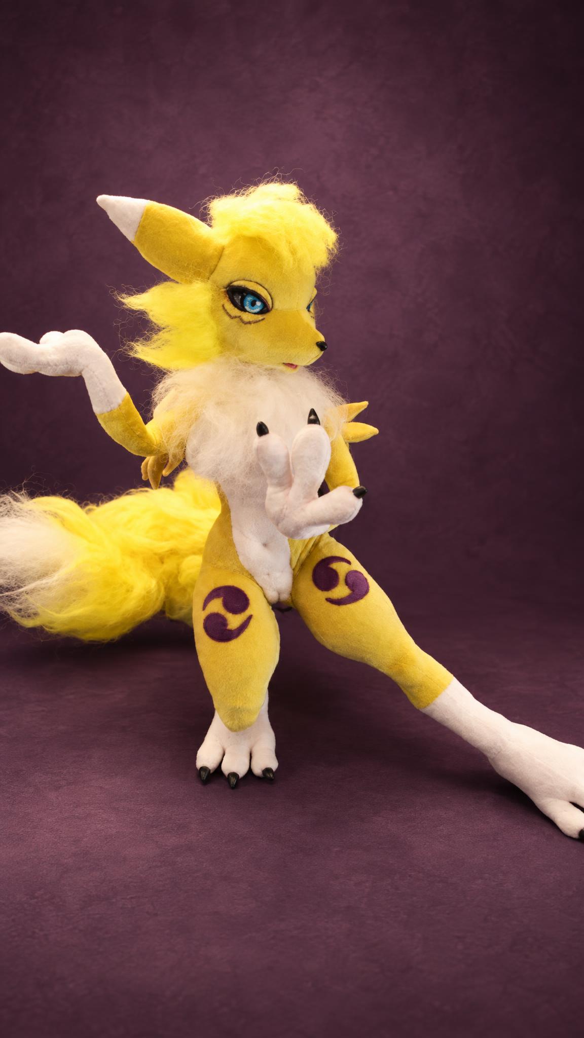 Poseable Renamon plush in a wide fighting stance, jointed limbs and yin-yang marks, a handmade Digimon doll