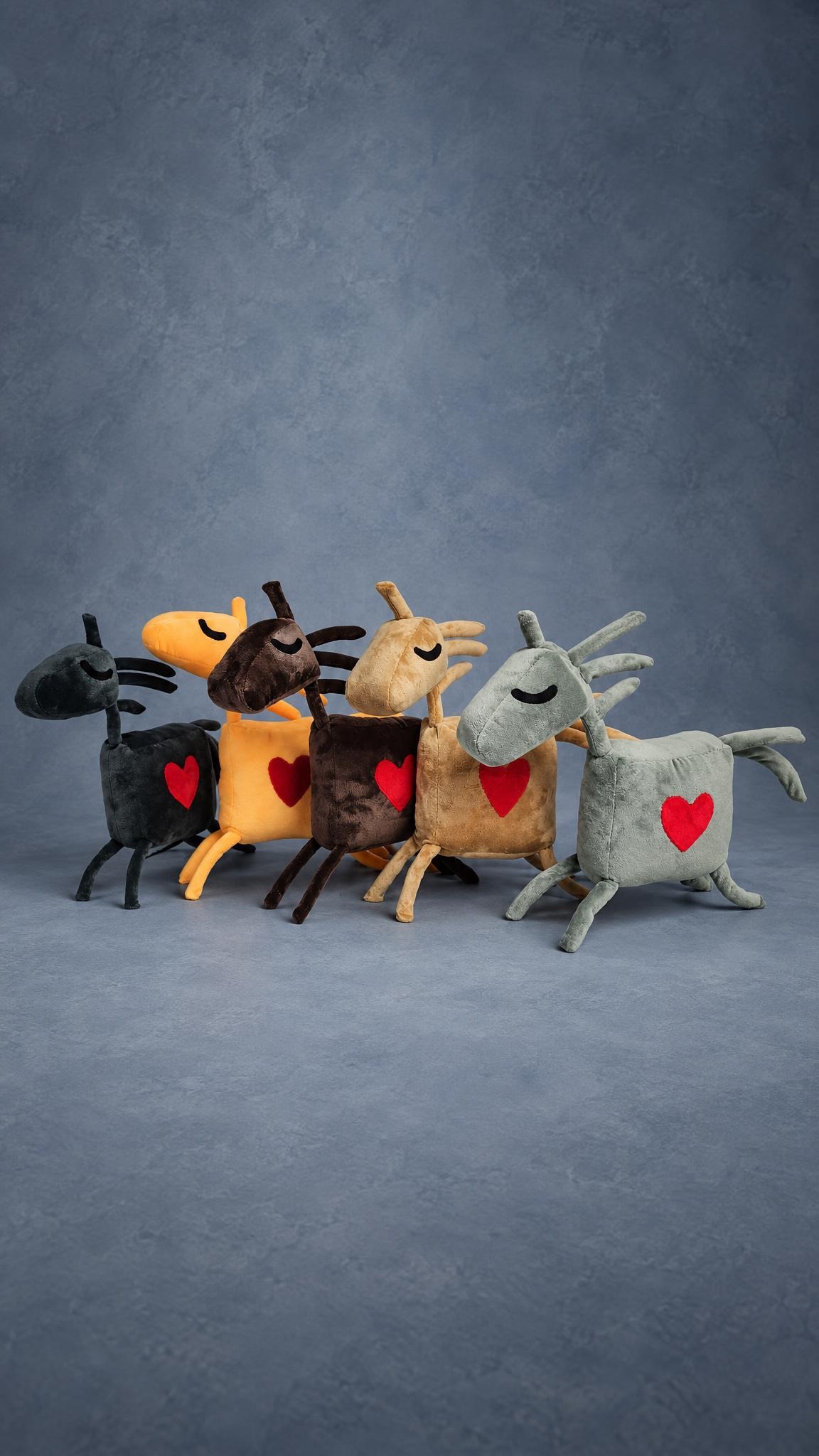 A batch of riding club horse mascot plushes in five colours, all with red hearts, made to order