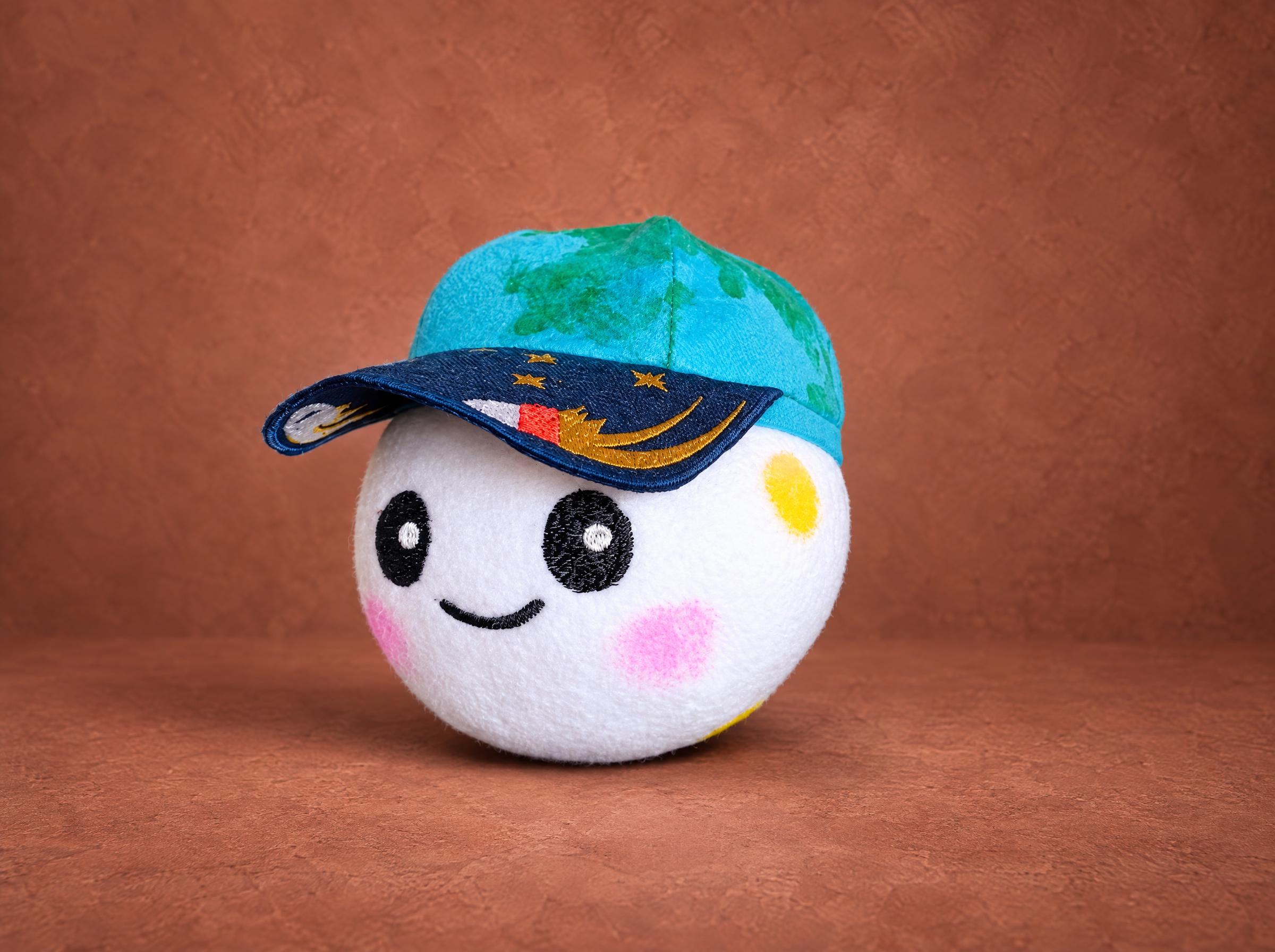 Rise plush from Artemis II, handmade to order: white moon with embroidered smile and a turquoise Earth cap