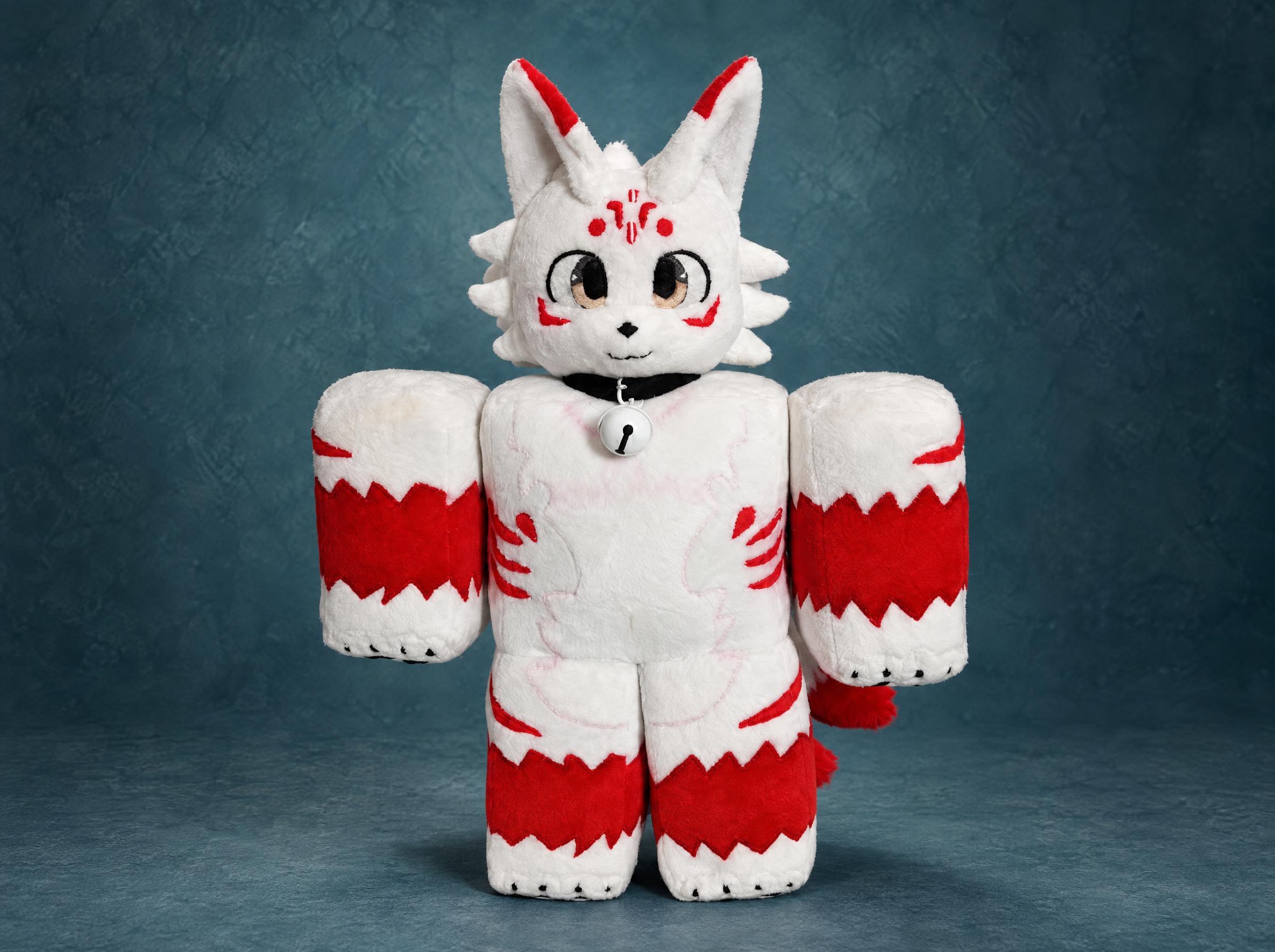 Custom Roblox avatar plush, a blocky white fox with red zigzag stripes and a bell collar, handmade to order