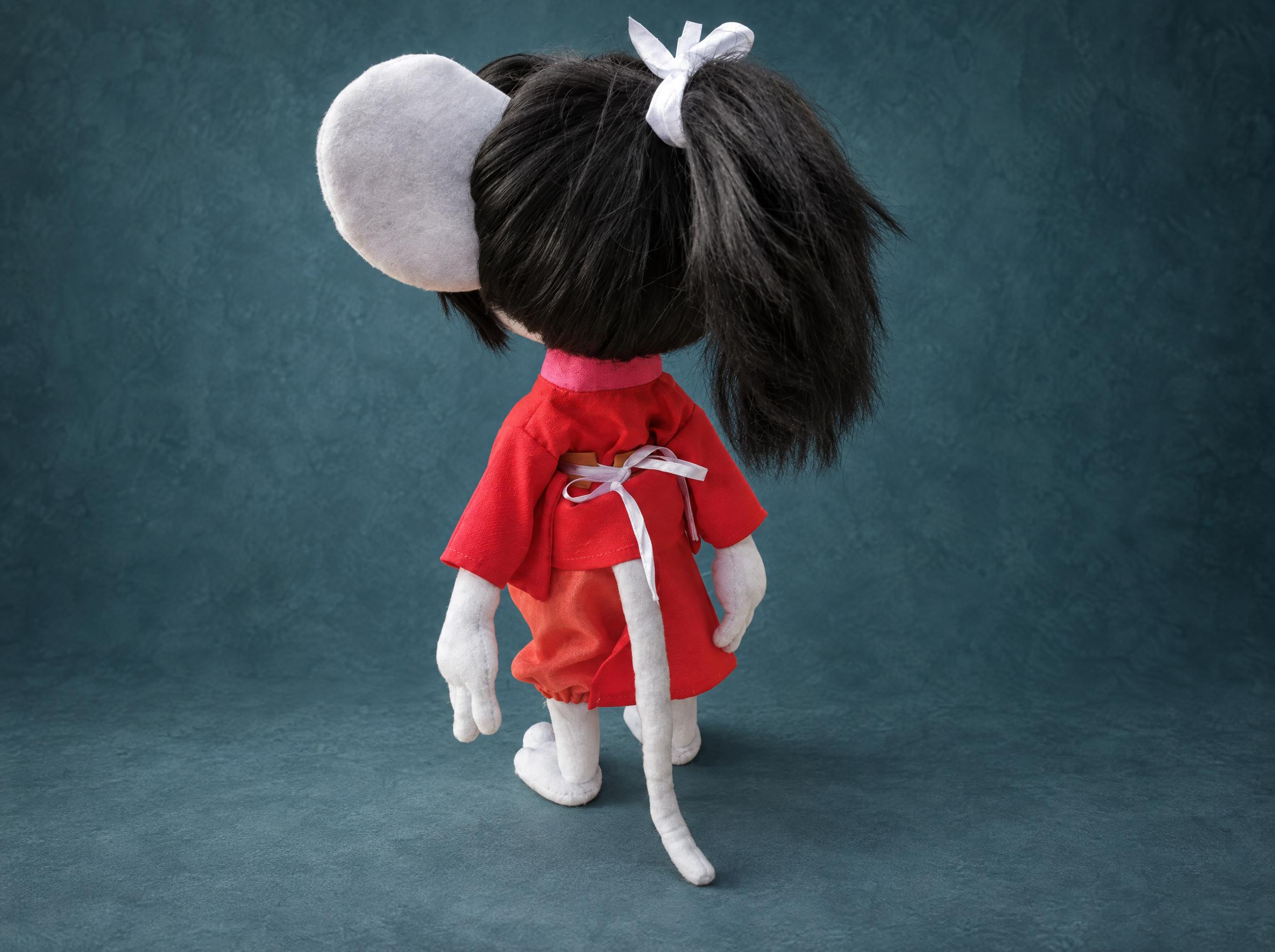 Samurai Rat Plush Back Samurai rat plush from behind with a black ponytail, white bow and red kimono, a custom handmade rat plush