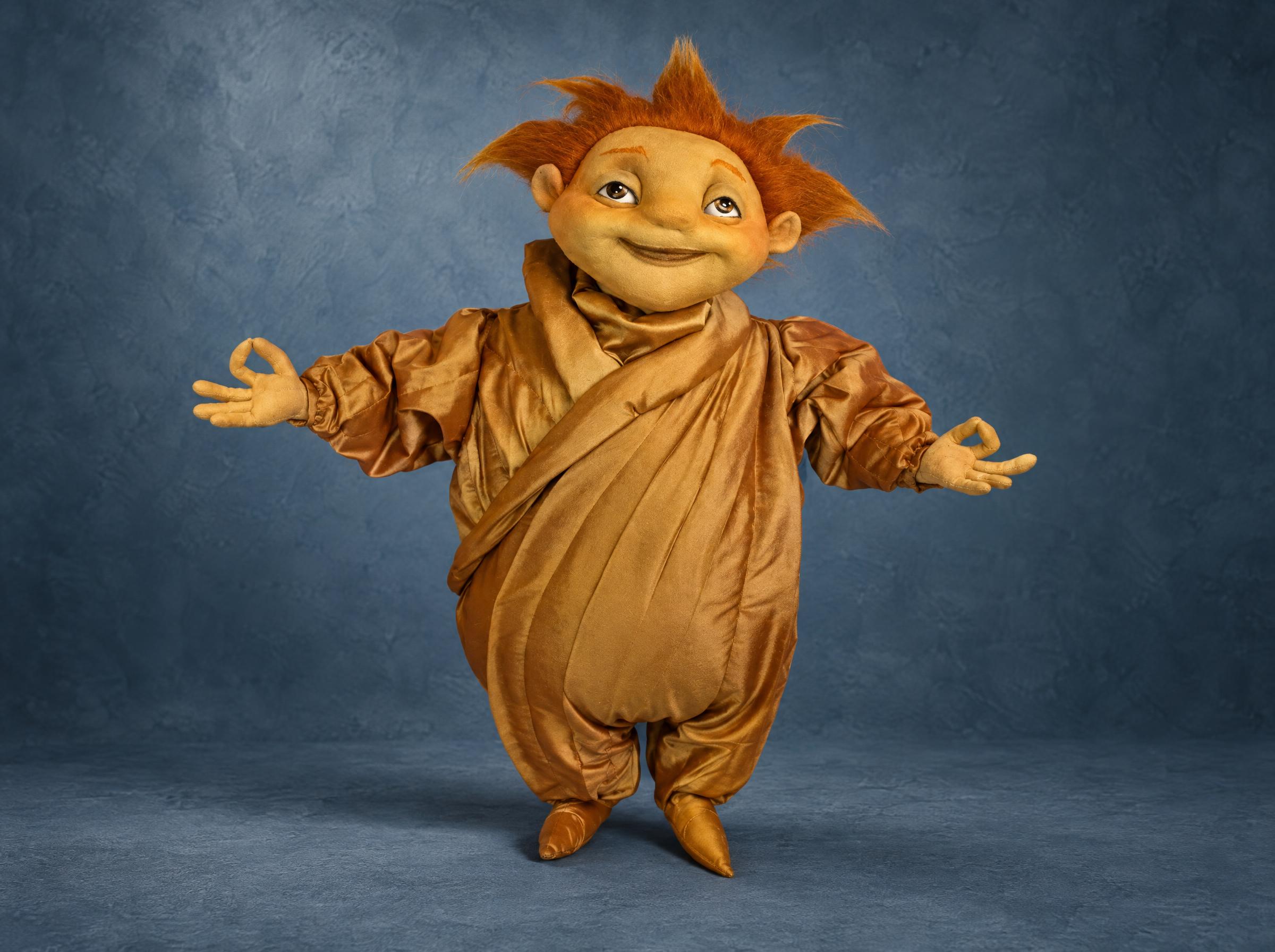 Sandy plush from Rise of the Guardians in a gold satin robe with spiky ginger hair, a custom Sandman made to order