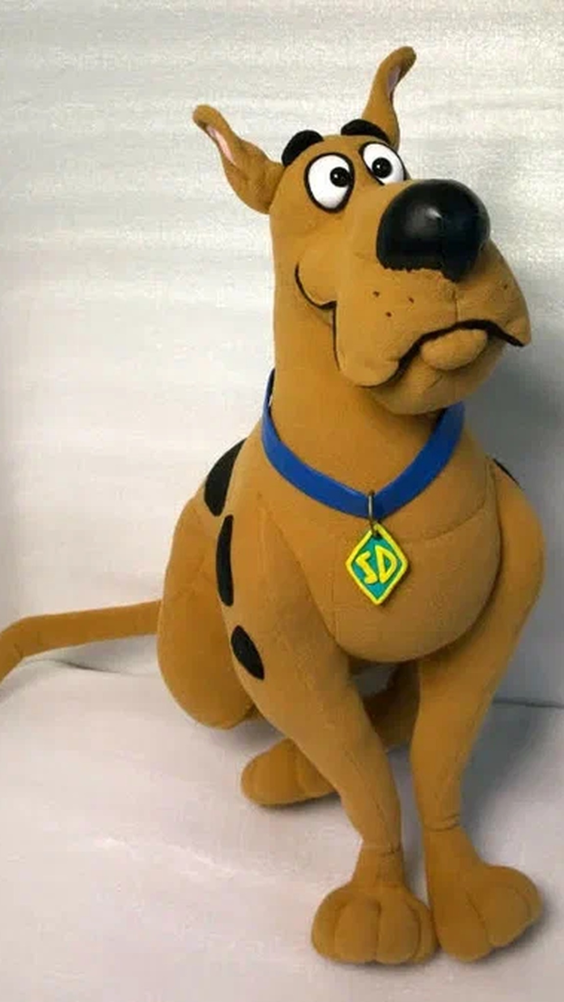 Handmade Scooby-Doo plush with pink inner ears, round eyes and a droopy chin, sewn to order in fleece