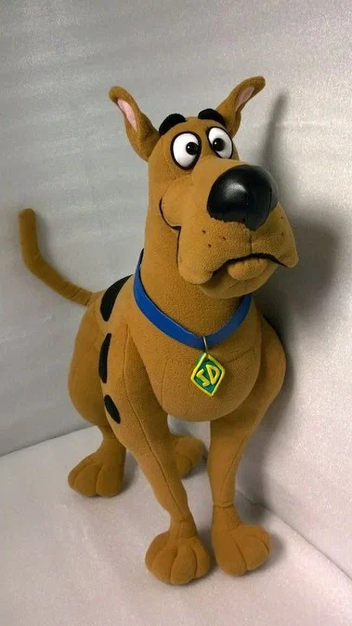 Scooby-Doo stuffed animal in brown fleece with the blue collar and SD tag, a custom cartoon dog made to order