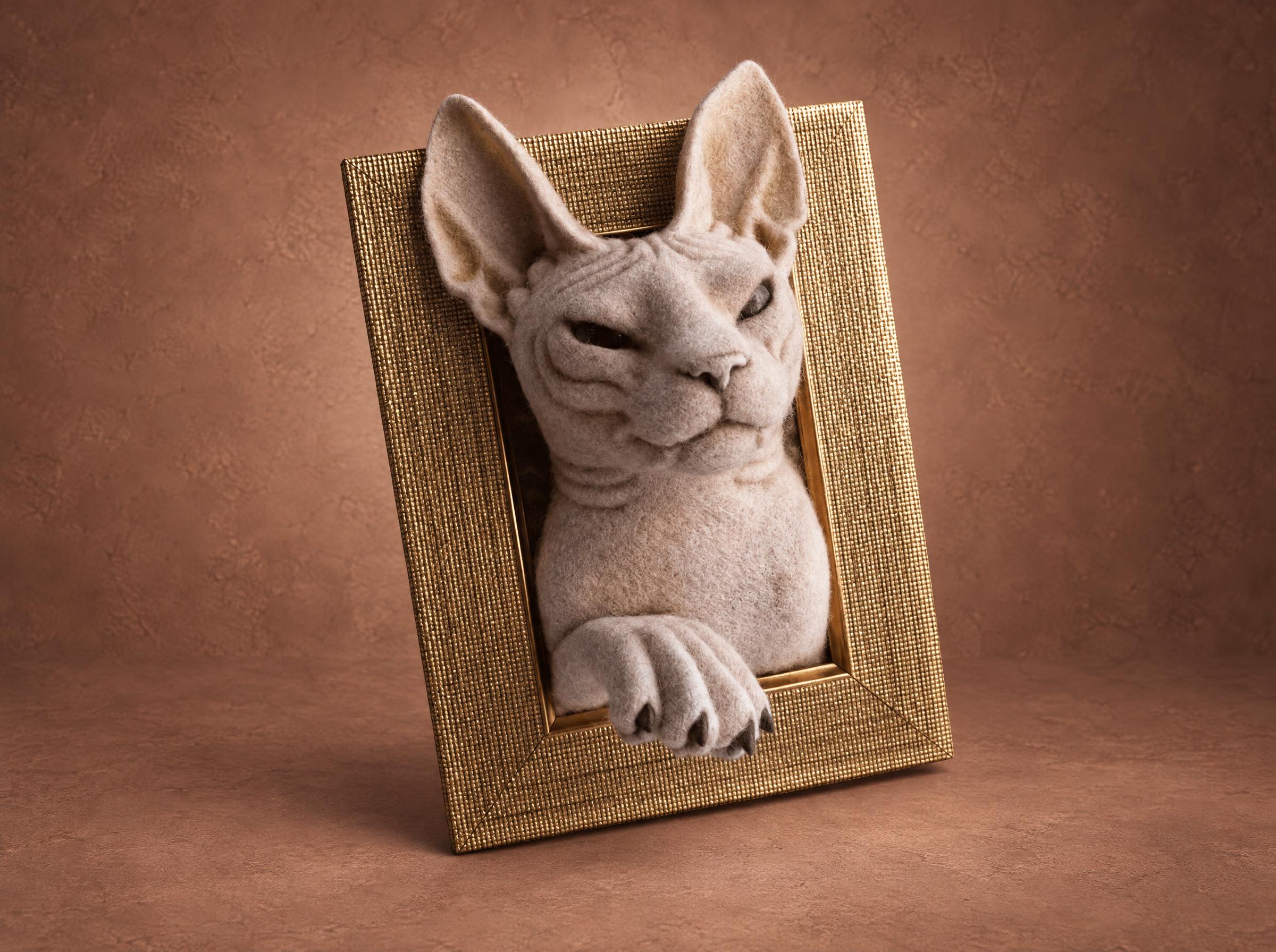 Custom pet wall portrait: Sphynx cat needle felted to order from photos, leaning out of a gold frame, paw over the edge