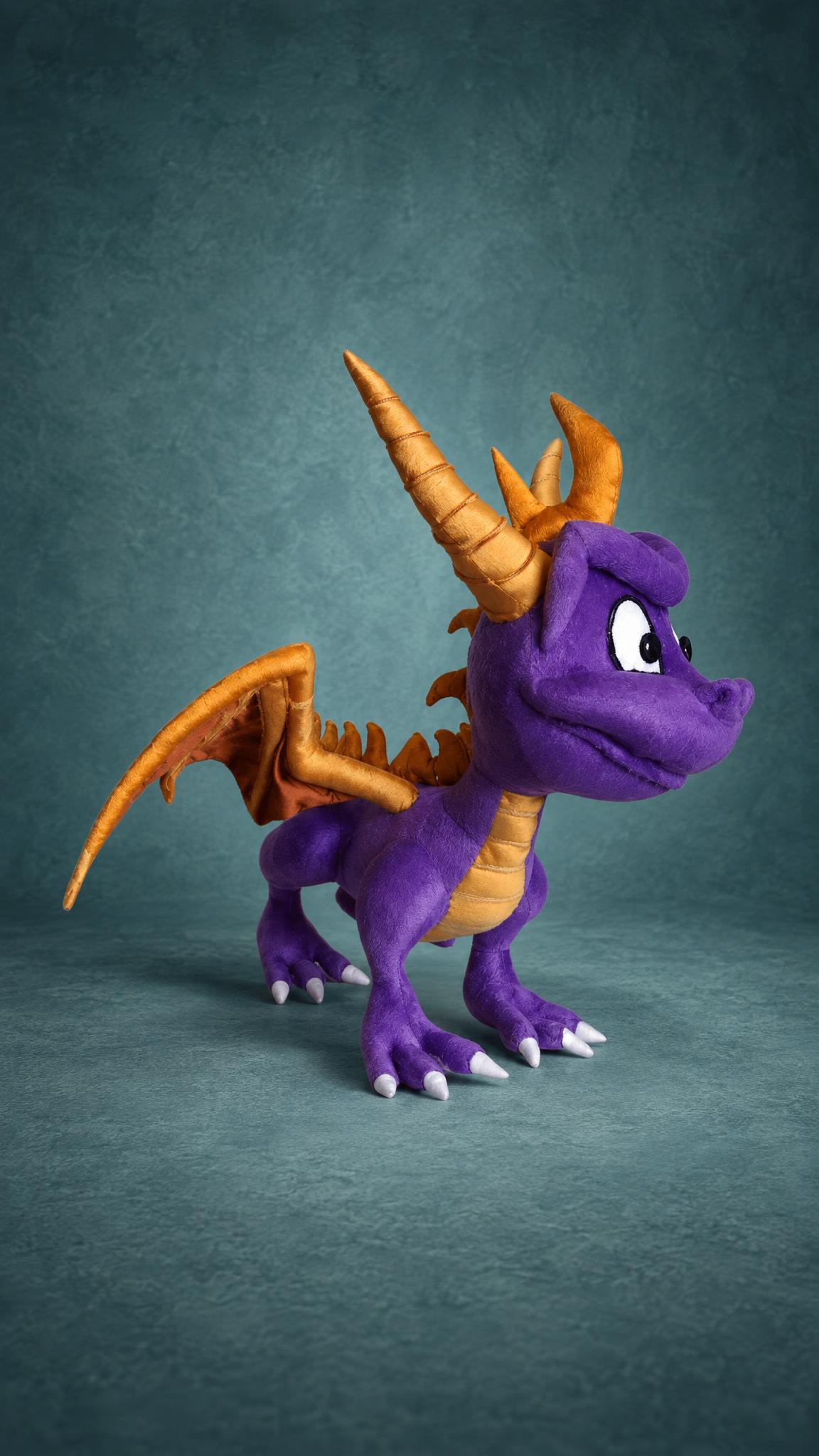 Spyro stuffed animal with one gold wing spread, purple plush and gold horns, a custom handmade Spyro plush