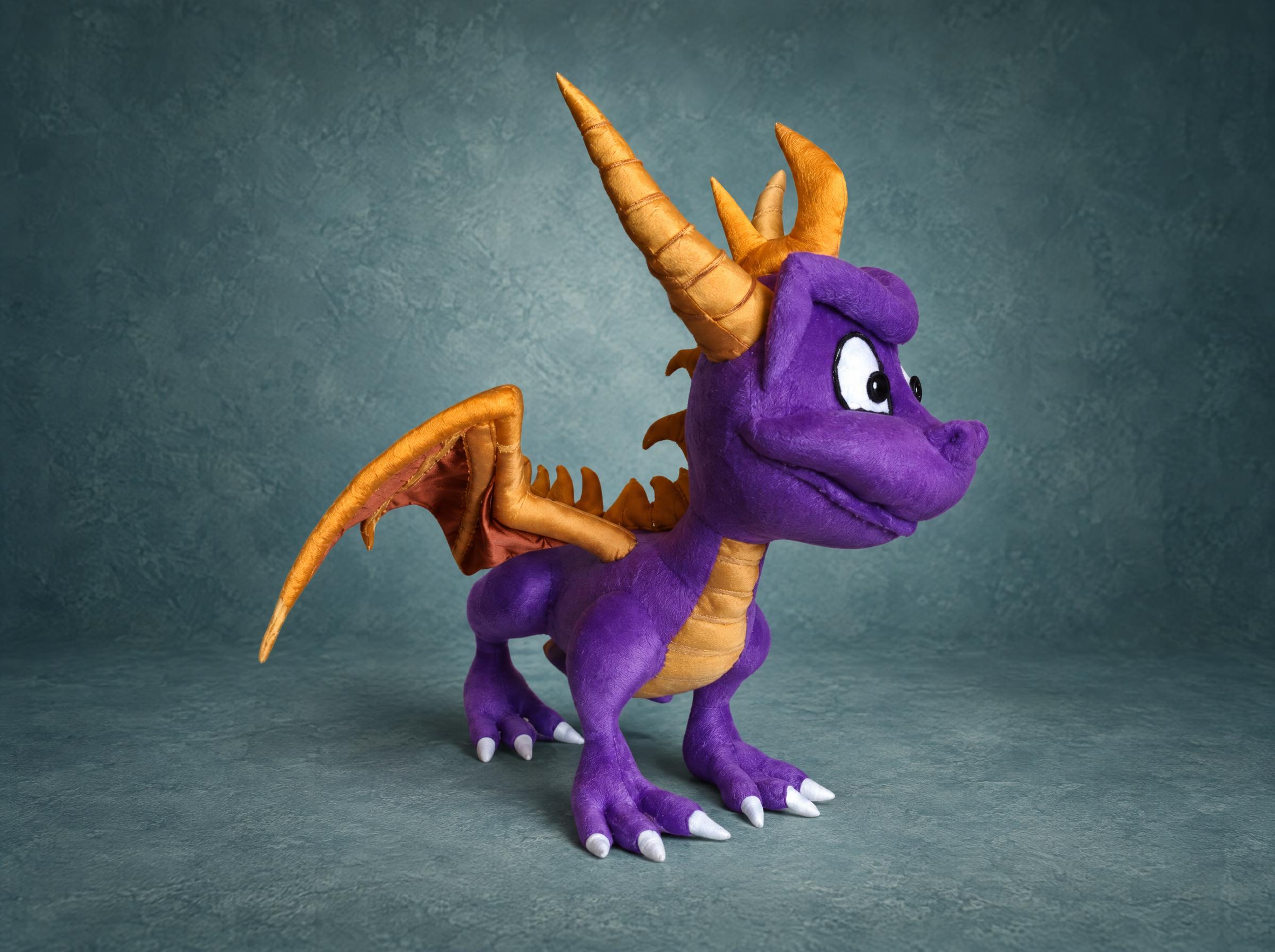 Spyro Stuffed Animal, Wing Spread Spyro stuffed animal with one gold wing spread, purple plush and gold horns, a custom handmade Spyro plush