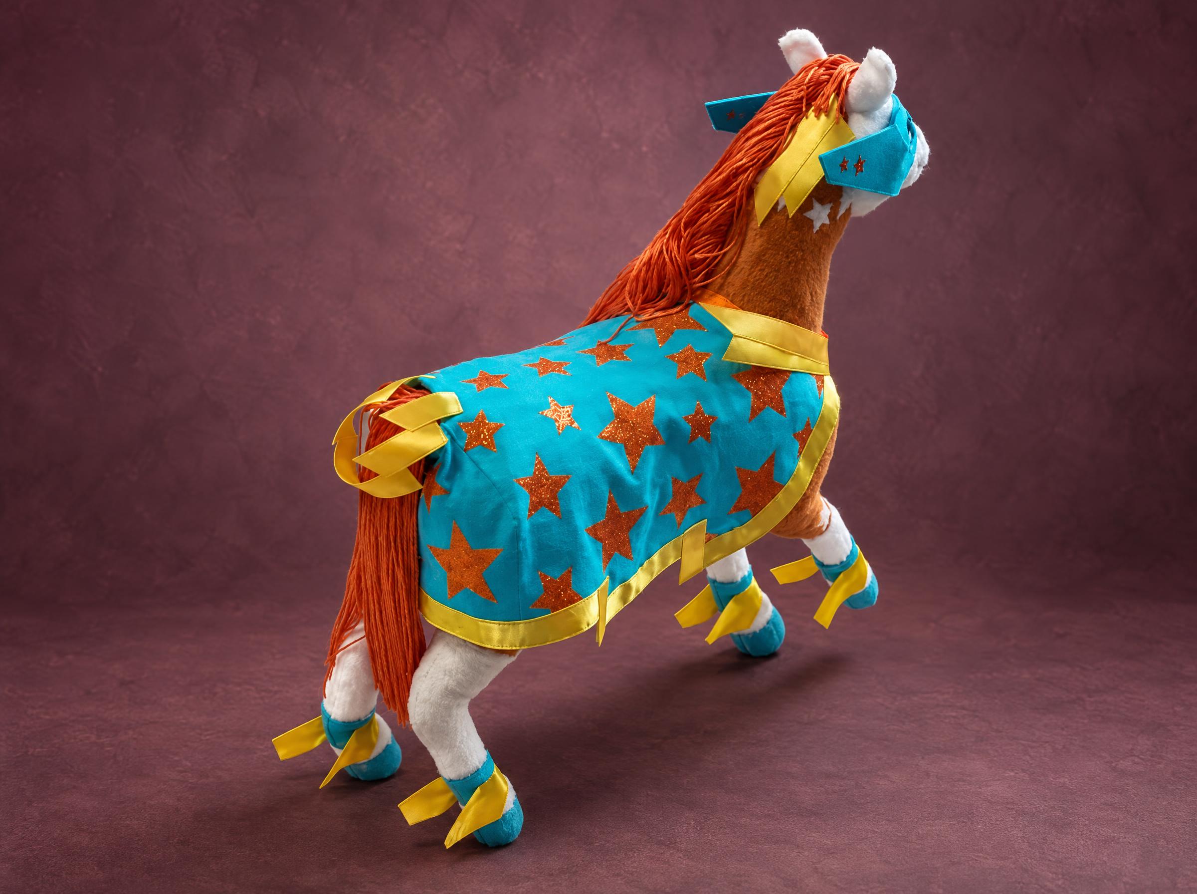 Superhero Horse Plush Mane and Tail Superhero horse plush with a long orange yarn mane and tail and a turquoise star cape, a custom handmade toy