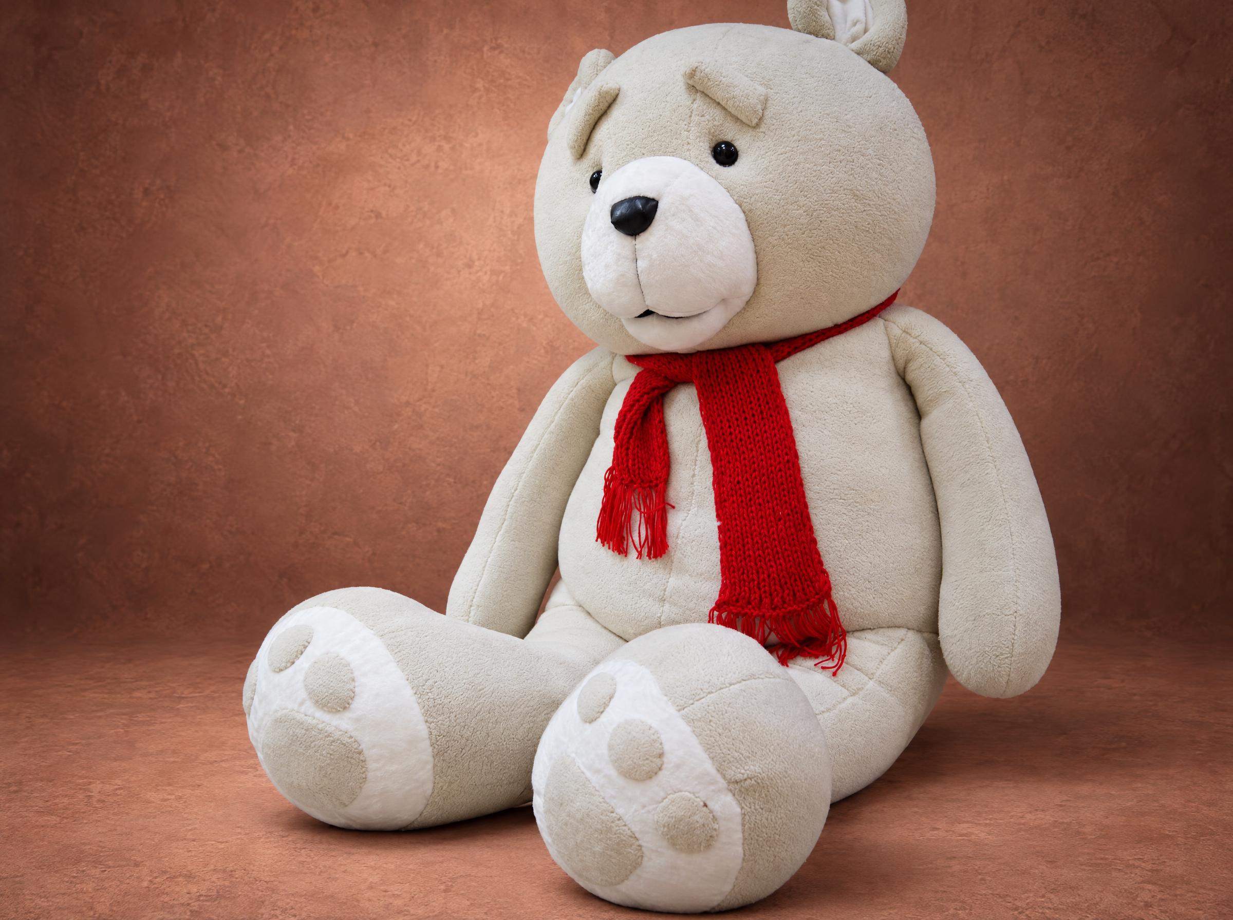 Ted movie bear plush with a red scarf Ted movie bear plush seated with a red knitted scarf, a giant custom teddy sewn by hand to order