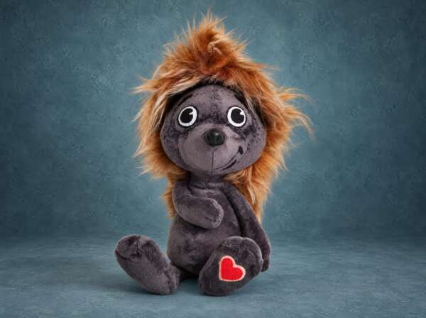 Tryam hedgehog plush, handmade to order as an I love you gift: grey body, ginger fur spines, red felt heart