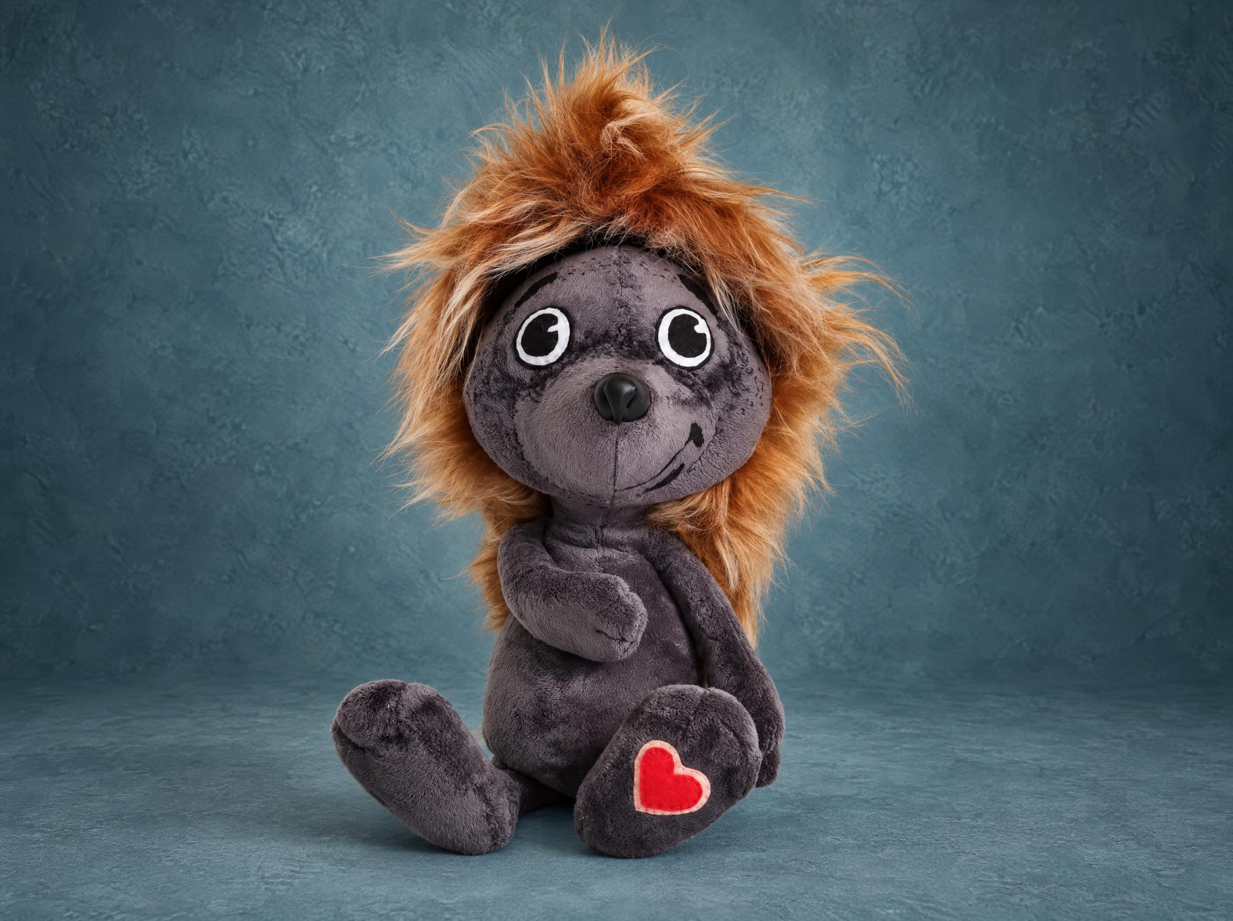 Tryam hedgehog plush, handmade to order as an I love you gift: grey body, ginger fur spines, red felt heart