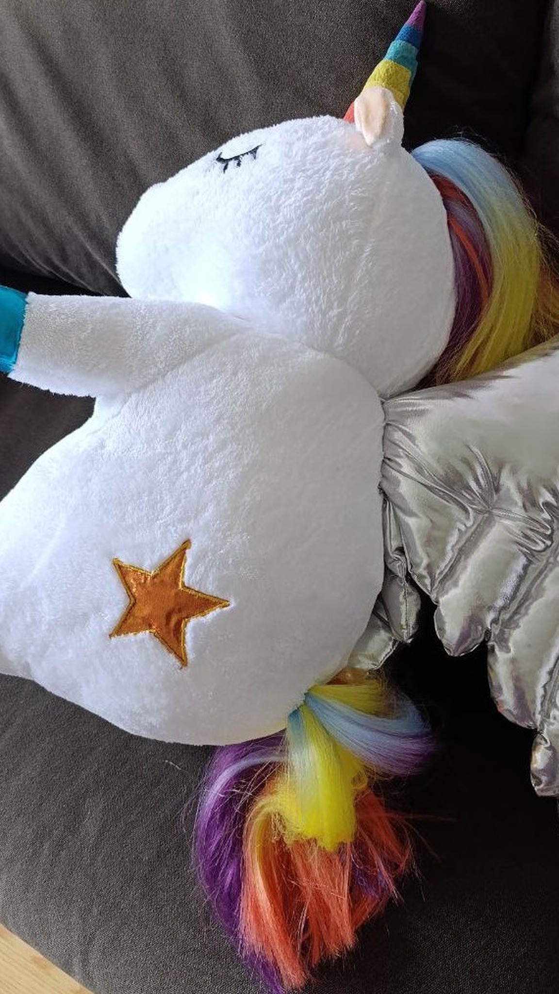 Handmade unicorn stuffed animal, orange star on the hip and rainbow tail, made to order from a kid's drawing
