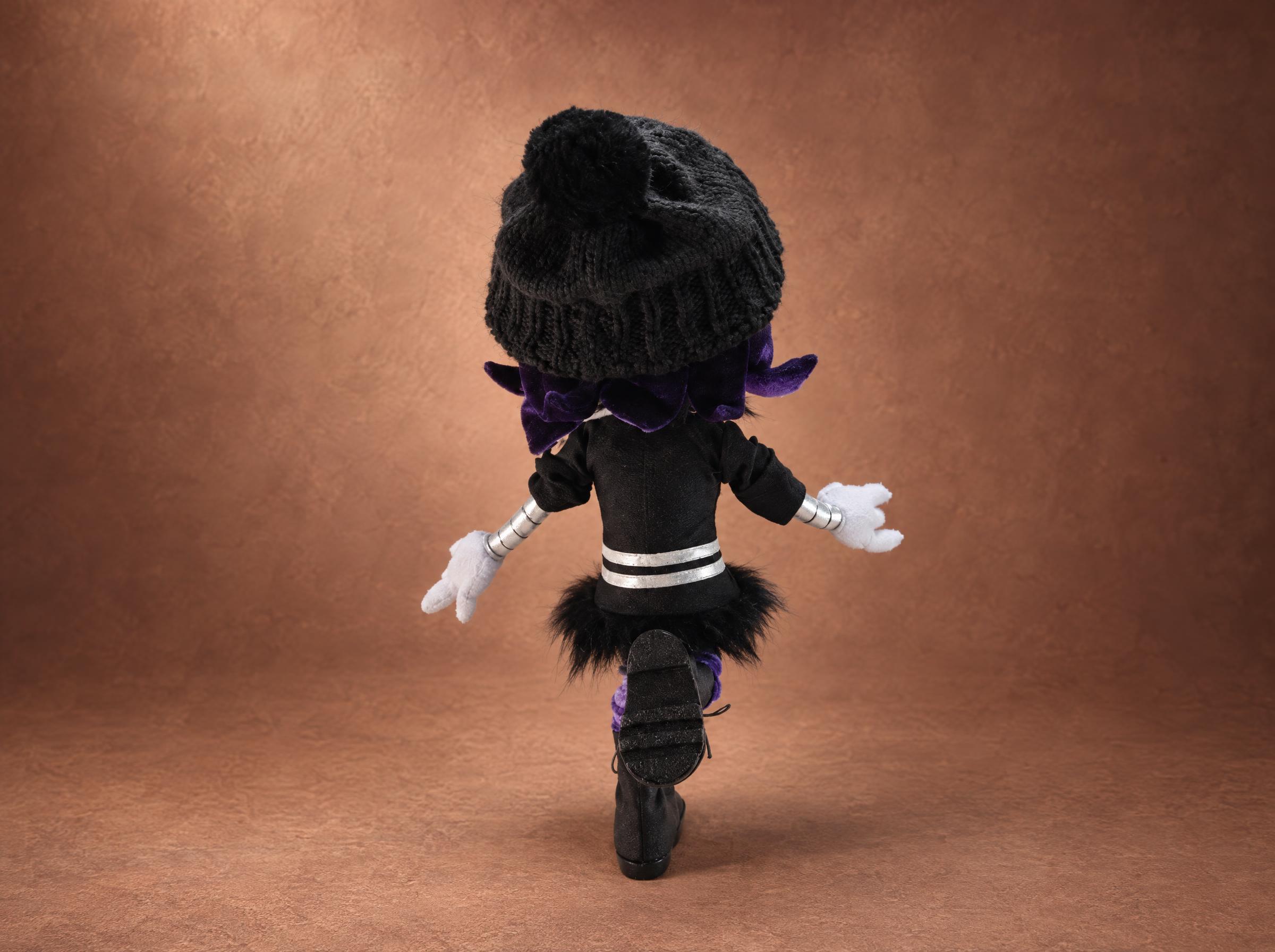 Uzi plush from behind, beanie and skirt Uzi plush from behind: grey beanie, purple hair and black fur skirt, a Murder Drones doll made to order