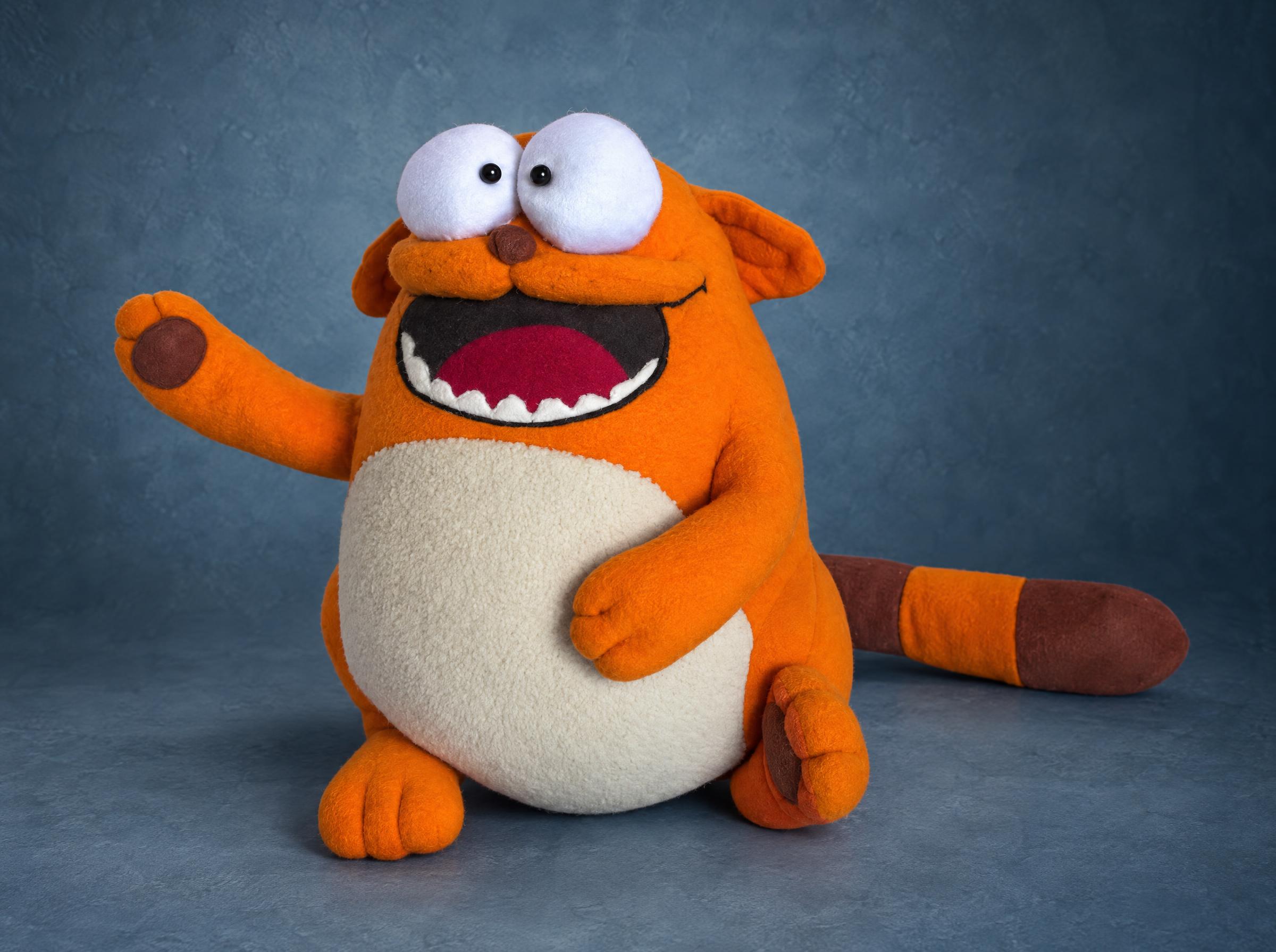 Viber cat plush waving a paw Viber cat plush waving one paw, orange fleece with a cream belly and a striped tail, a custom sticker toy made to order