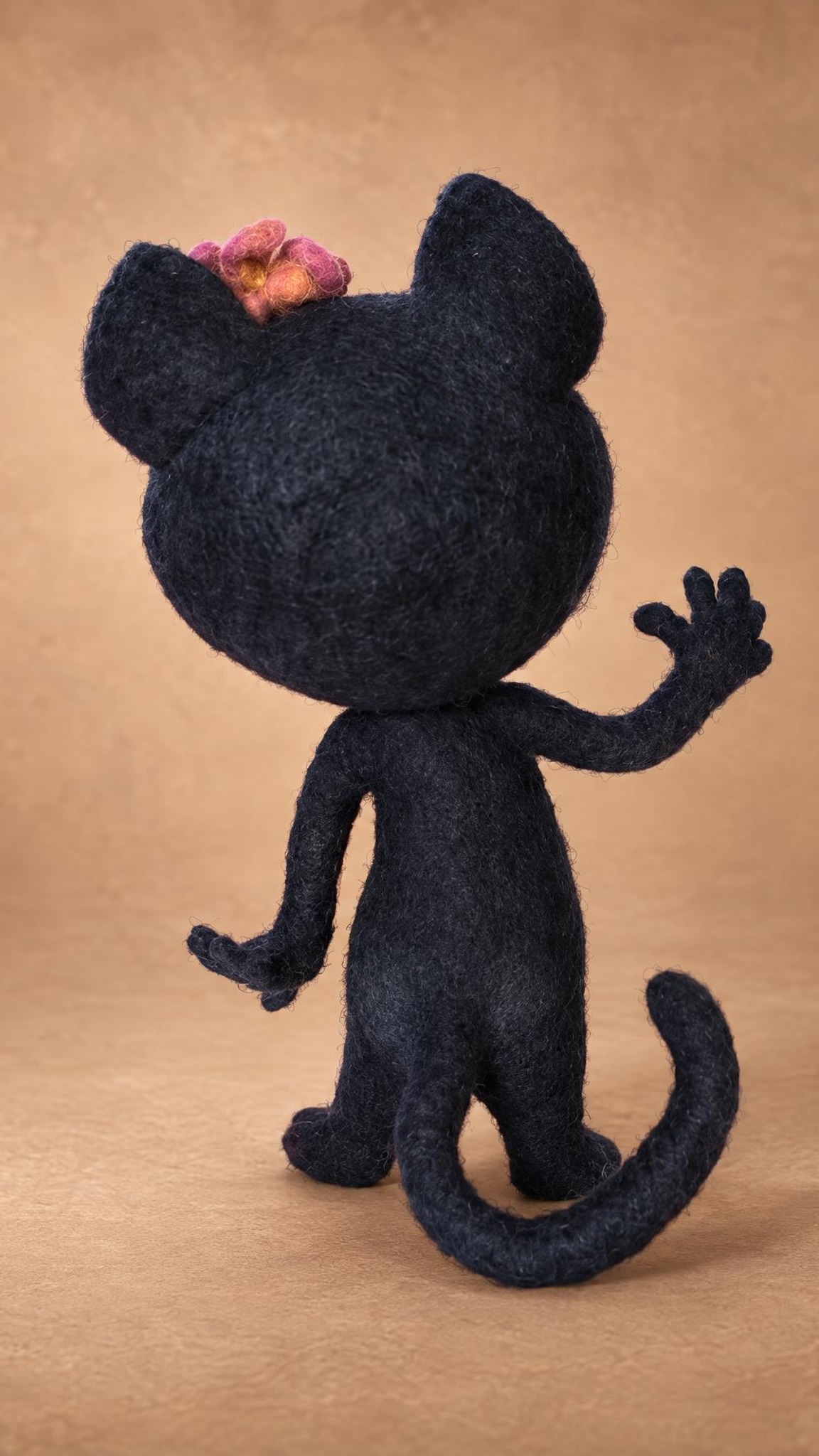 Viber sticker panther toy with a long curled tail and felted flower, needle-felted by hand to order