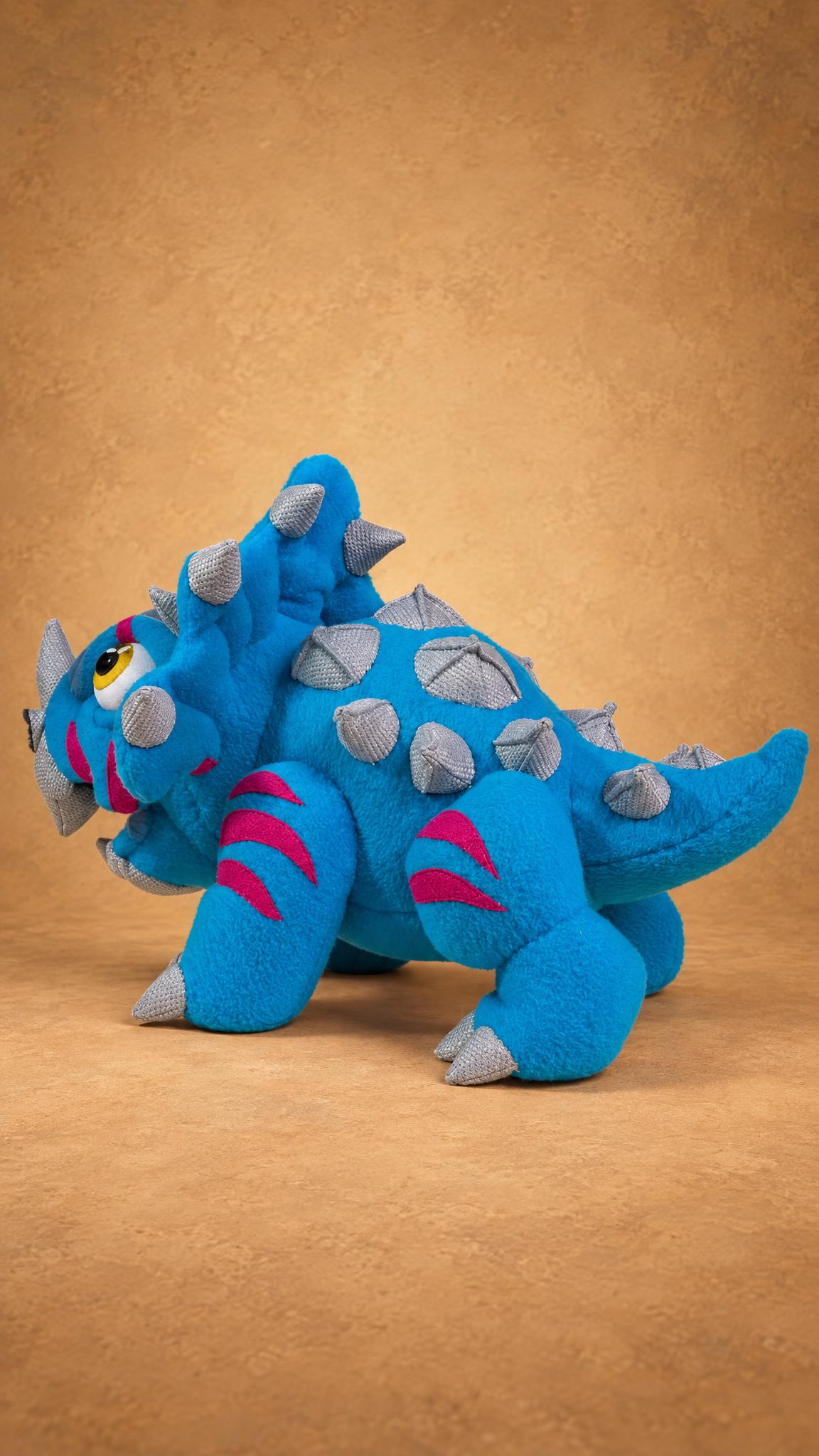 Wildhorn creature plush with spikes along the back and tail, handmade to order from a customer's art