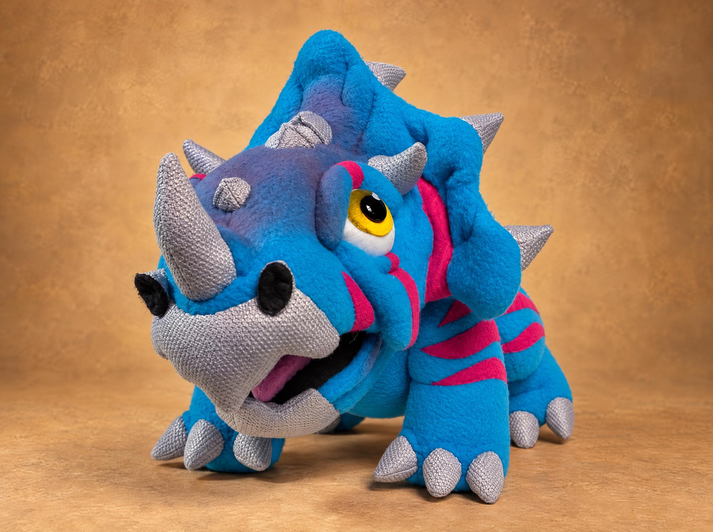 Custom triceratops plush Wildhorn in turquoise fleece with pink stripes, sewn by hand from a customer's drawing