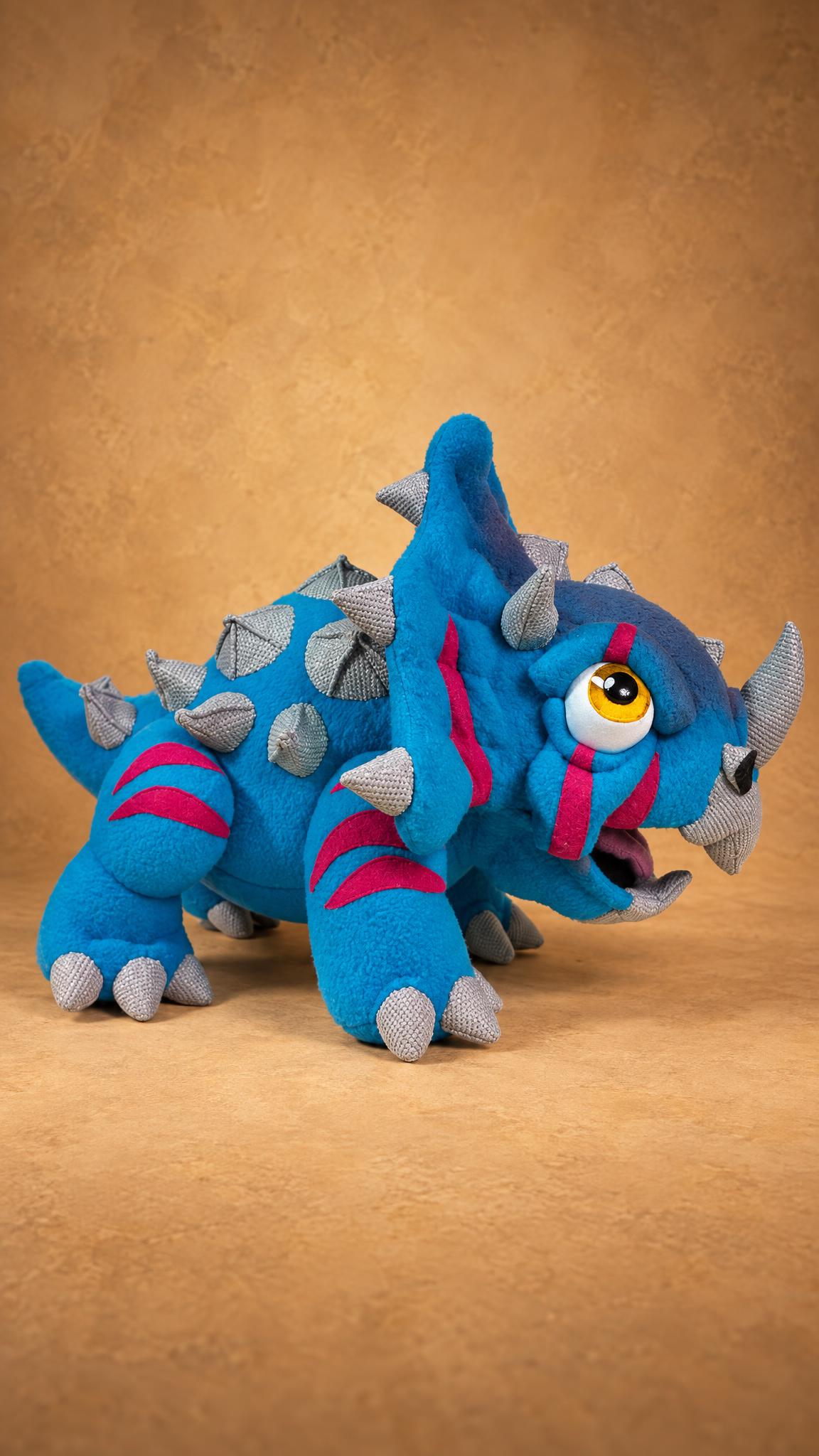 Custom dinosaur plush Wildhorn with a spiky back and frill, handmade from a customer's drawing, made to order