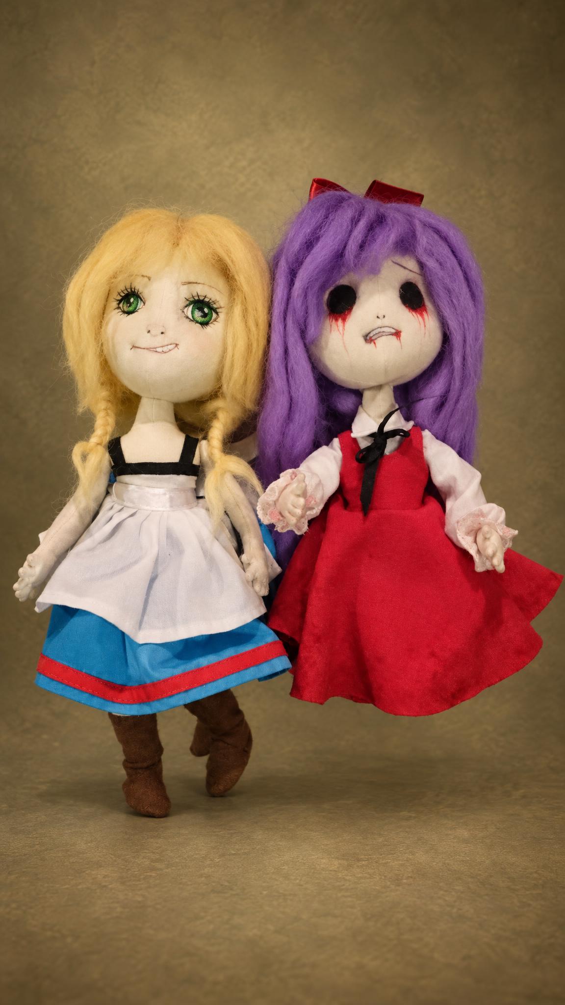 Handmade Witch's House dolls with the scary spare head on, bloody eyes and a red dress, custom horror dolls