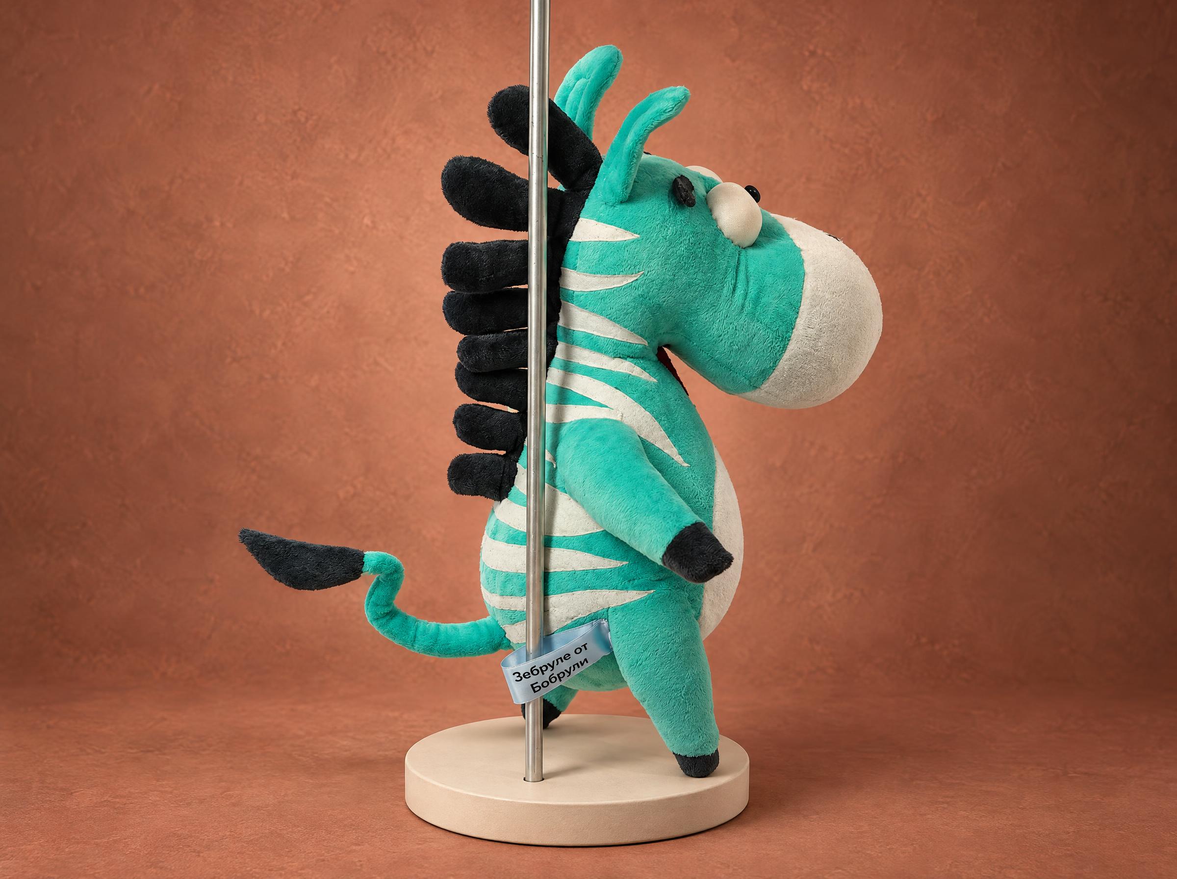 Zebra Plush Love Gift With a Personal Wish Tag Zebra plush love gift with a personal wish tag on a blue satin ribbon, sewn to order from a Telegram sticker