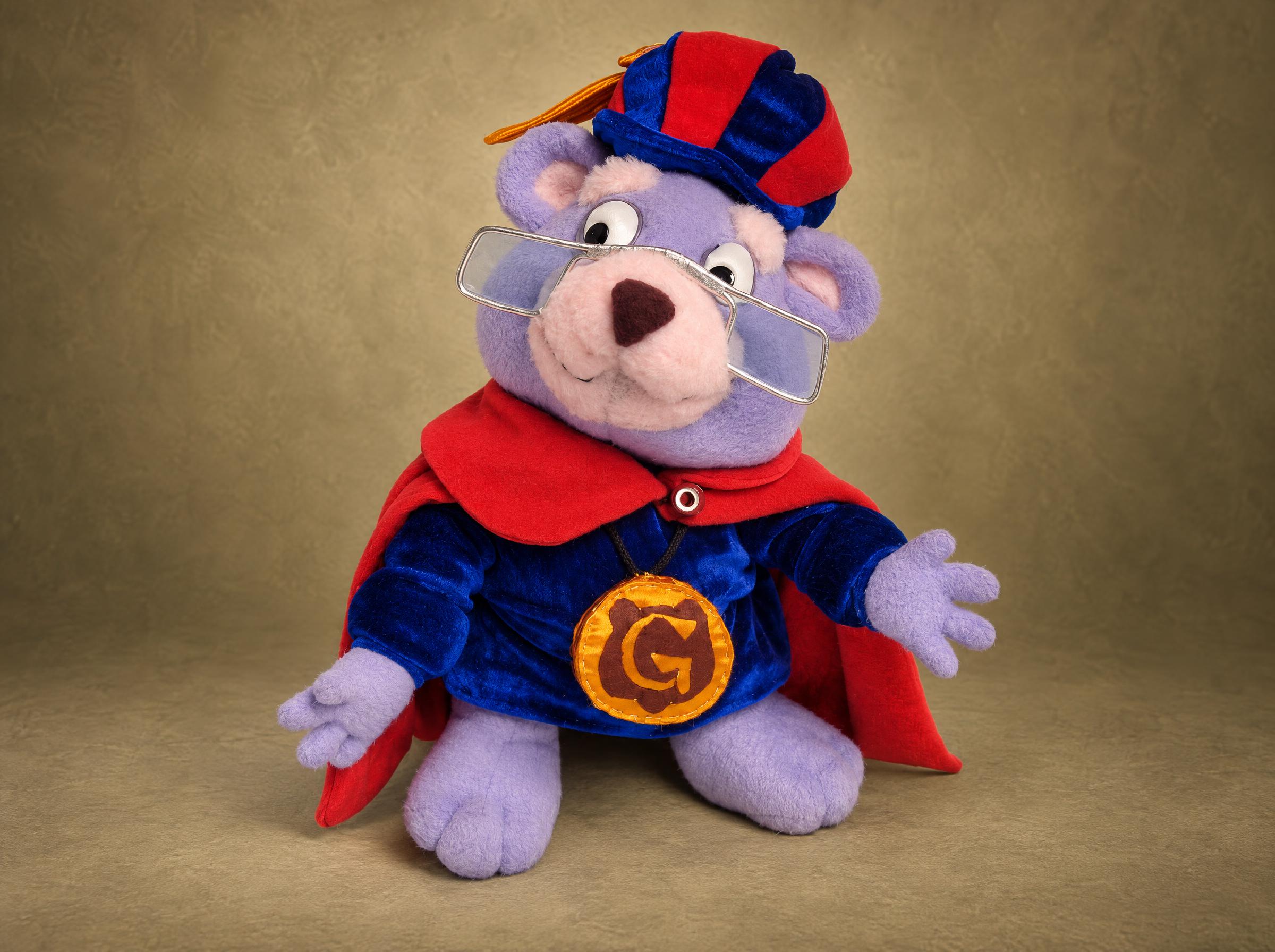 Zummi Gummi plush from the Gummi Bears in a blue cape with the gold G medallion and glasses, sewn to order