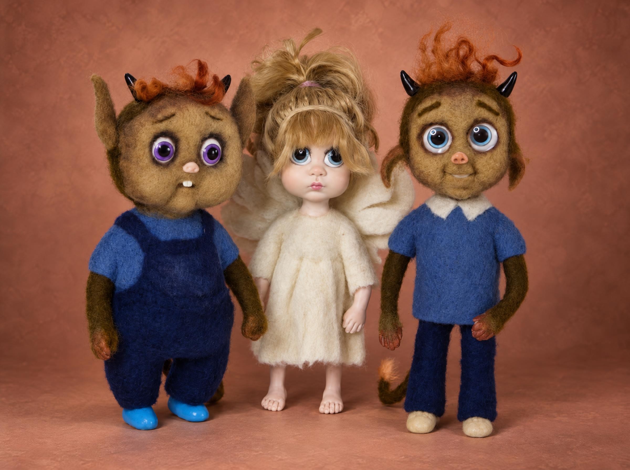 Needle-felted angel and devil dolls from a picture book: two horned devils and a winged angel, made to order
