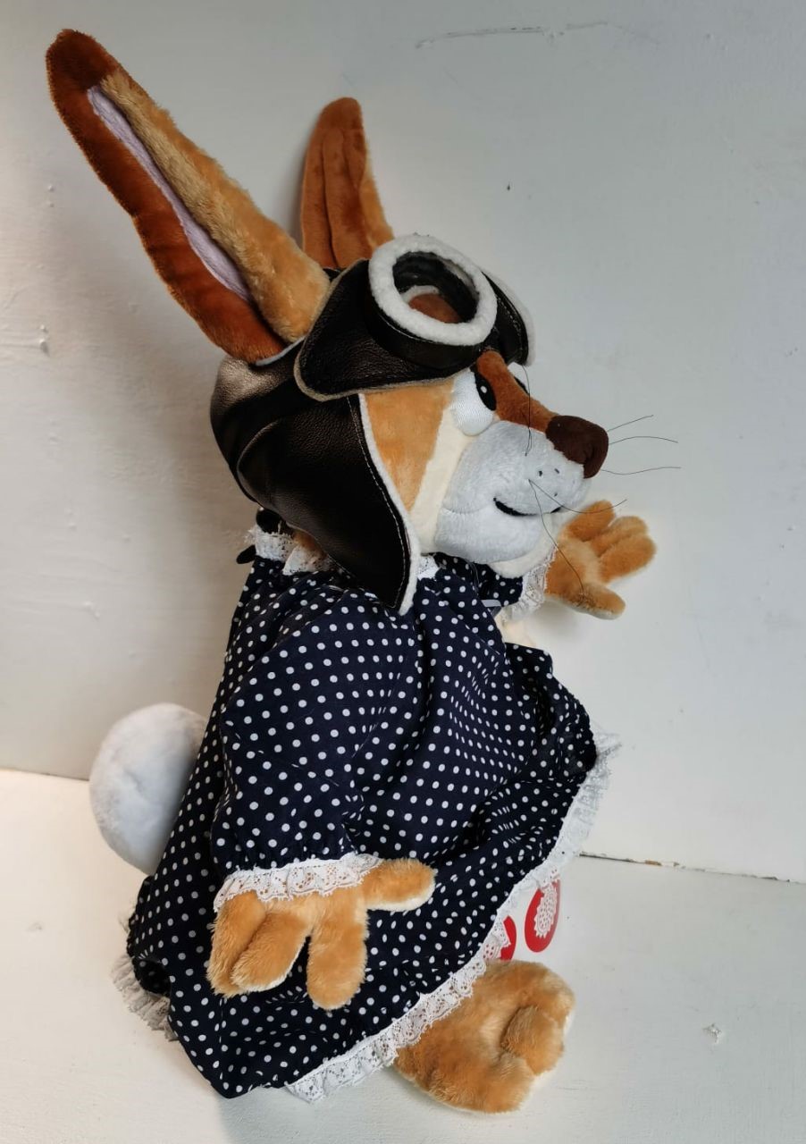Aunt Zinnia rabbit plush in an aviator cap Aunt Zinnia rabbit plush with a round white tail, faux leather aviator cap and lace cuffs, made to order