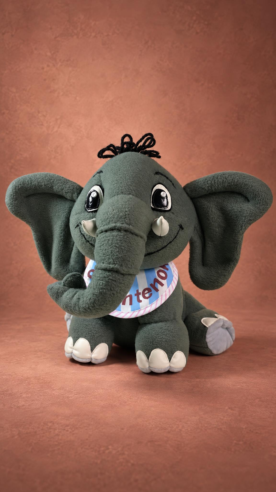 Baby elephant plush made to order: curled trunk, glossy eyes, white faux leather tusks and toenails