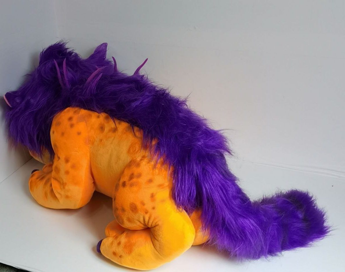 Big Orange plush, striped tail Big Orange plush with a long striped purple faux fur tail and spotted orange legs, custom movie monster toy