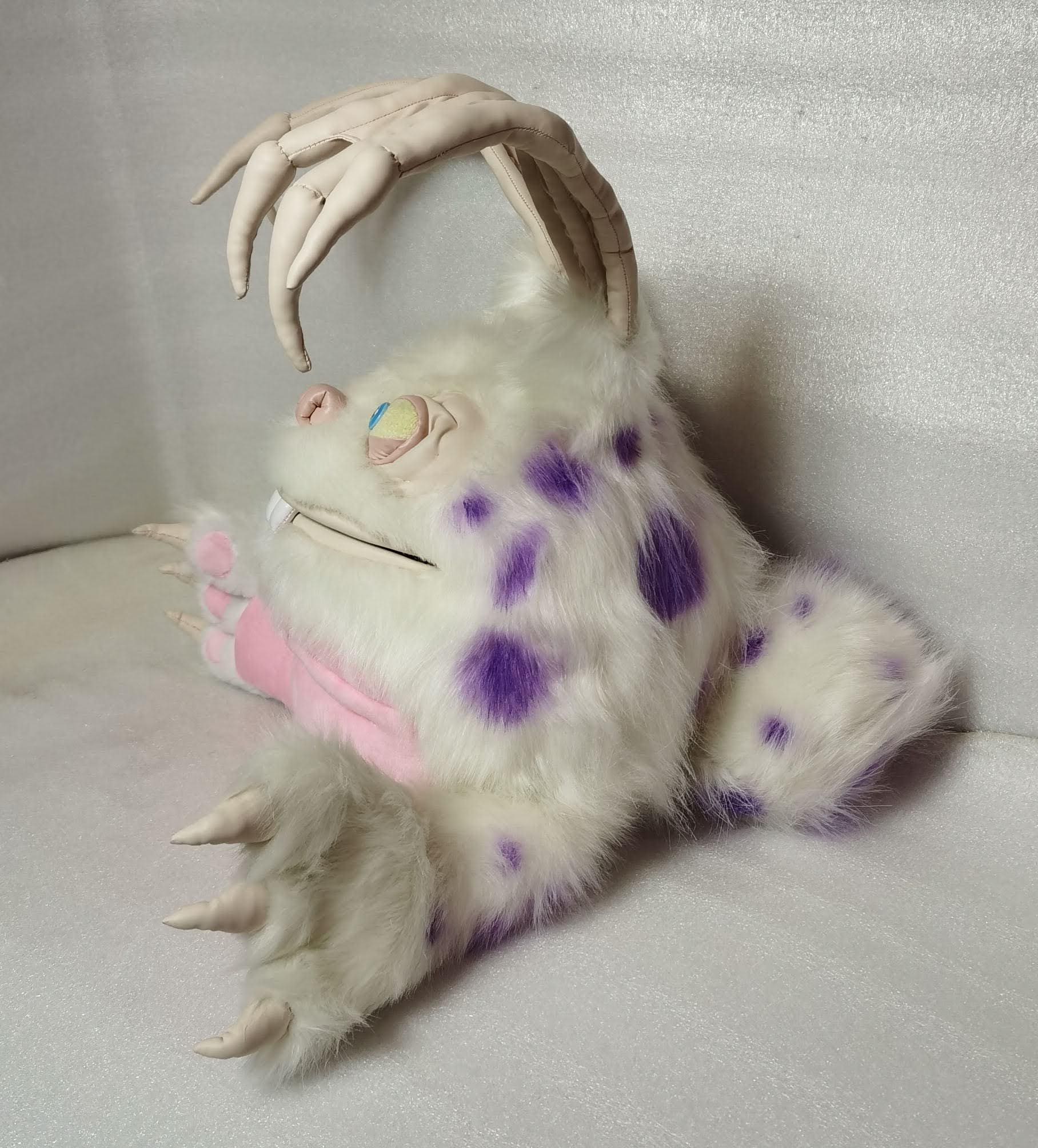 Blabbit plush with purple spots Blabbit plush lying on its side, white faux fur with purple spots and long bony finger ears, sewn to order