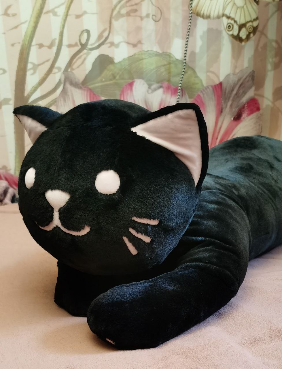 Black cat plush hug pillow, handmade Black cat plush hug pillow sewn to order, round head with white eyes resting on long black front paws